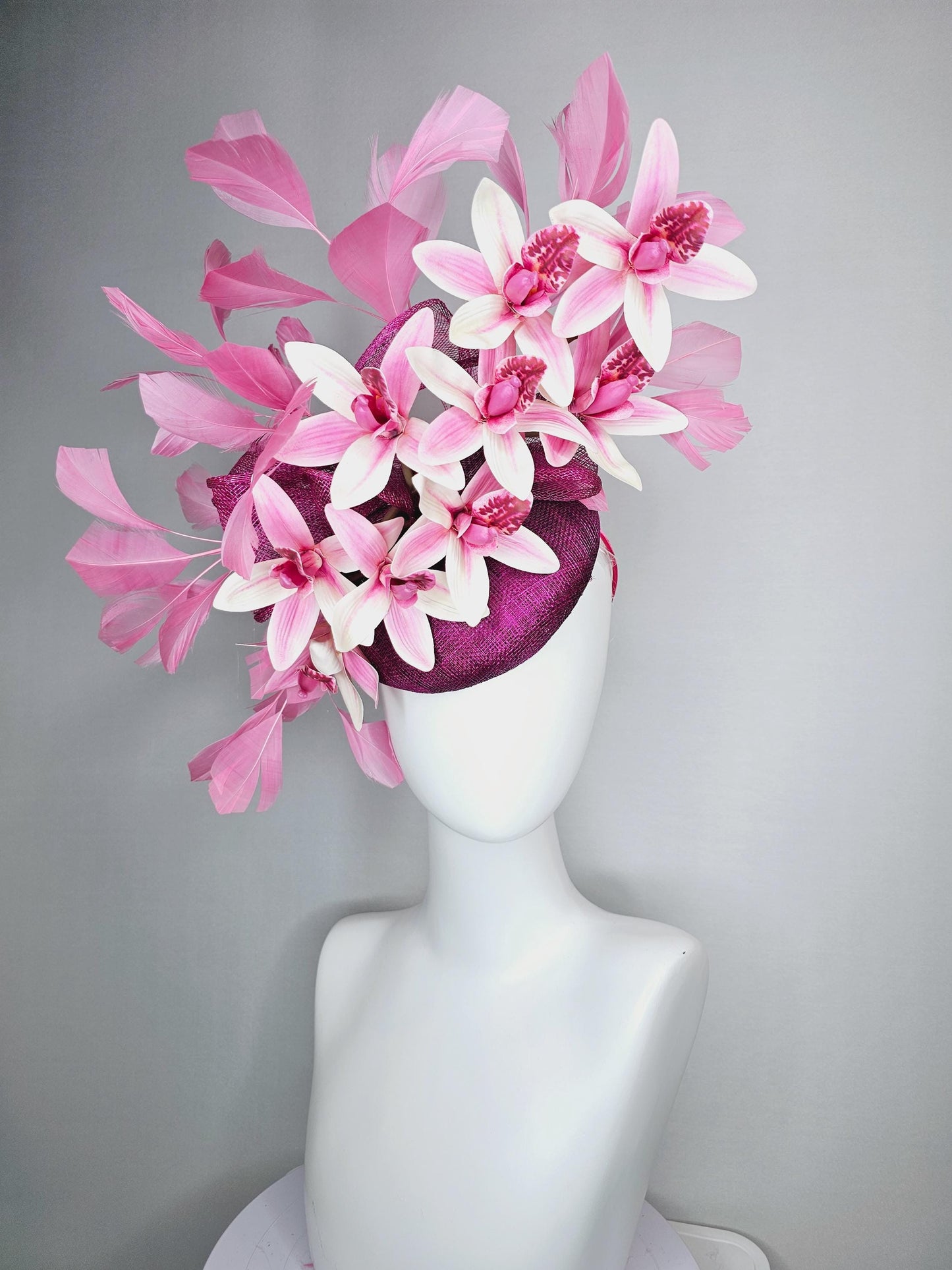 kentucky derby hat fascinator magenta purple sinamay with bow and white and pink satin orchid flowers with blush pink branching feathers