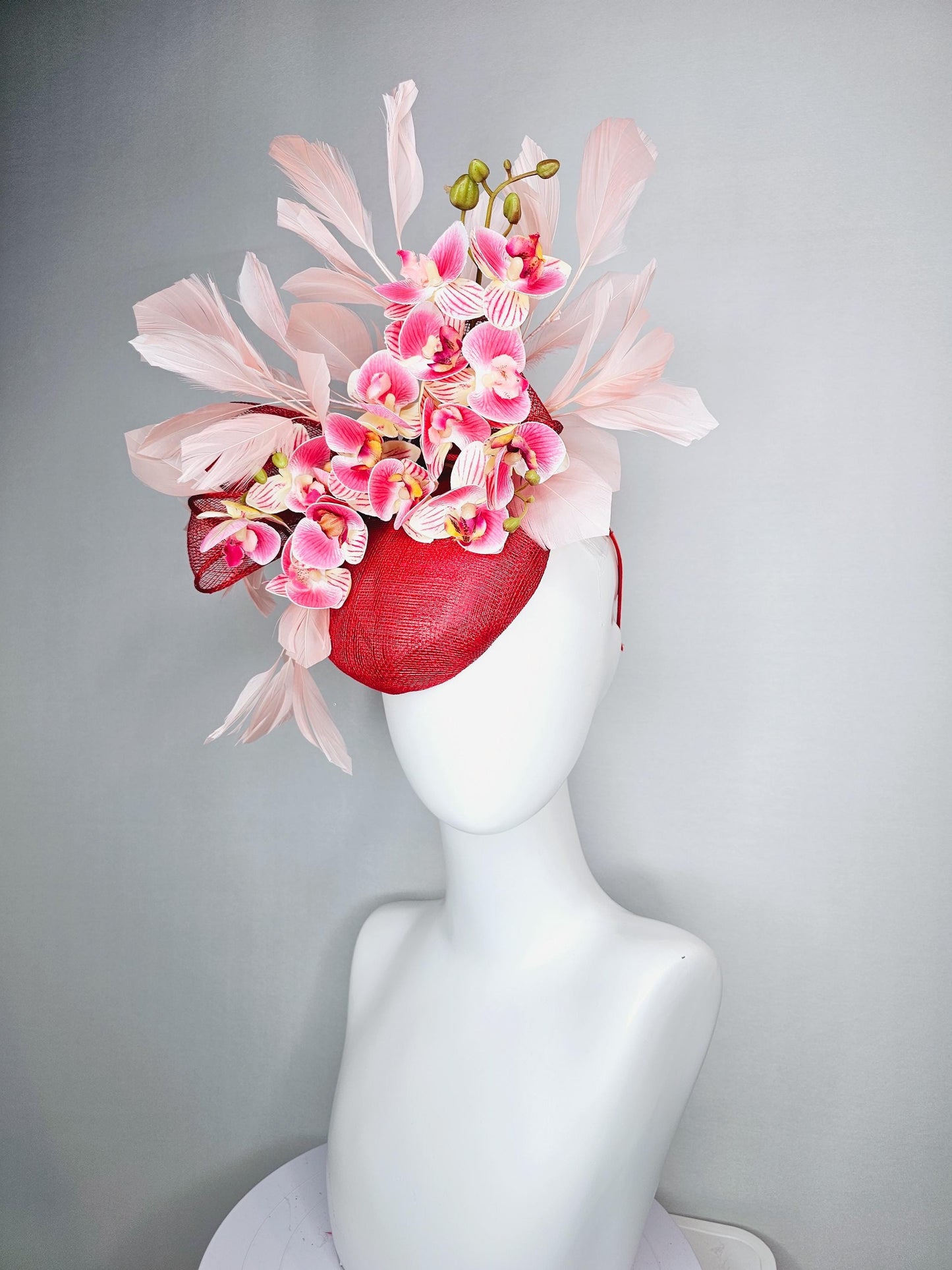 kentucky derby hat fascinator red sinamay with bow and white raspberry red pink satin orchid flowers with champagne pink branching feathers