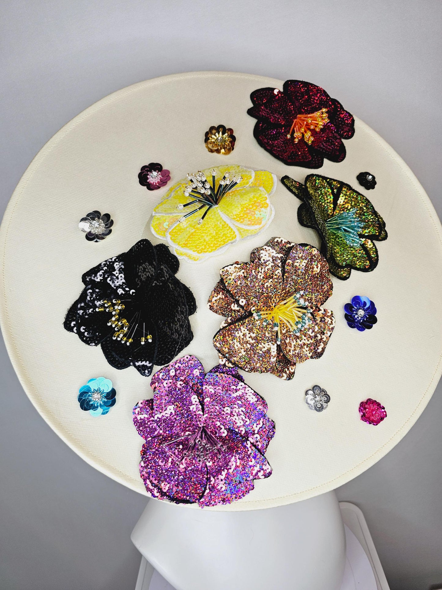 kentucky derby hat fascinator ivory white satin silk saucer with colorful sequin pink black yellow lime green lavender purple beaded flowers