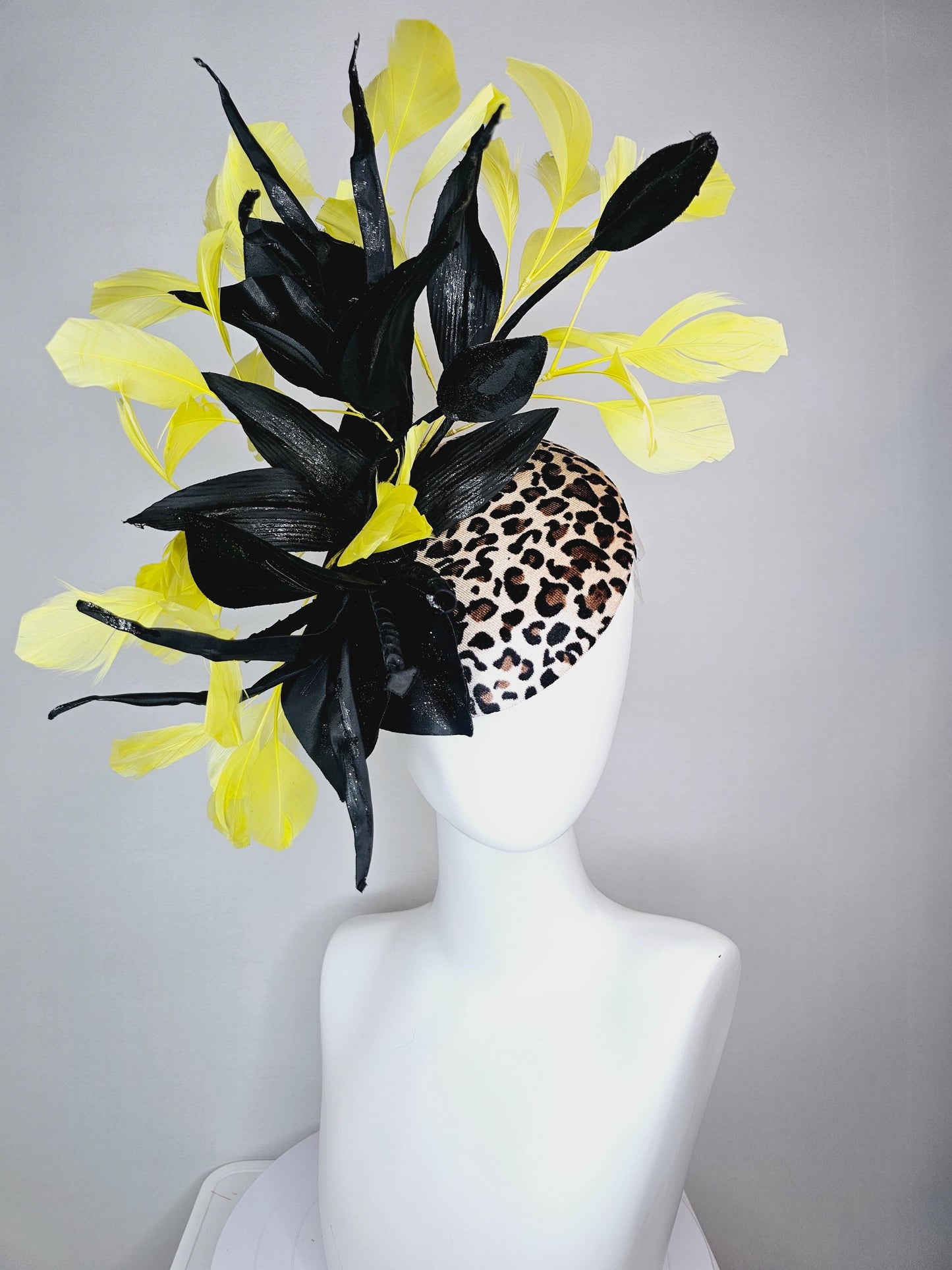 kentucky derby hat fascinator velvet leopard print with black satin flowers and satin black leaves with yellow branching feathers