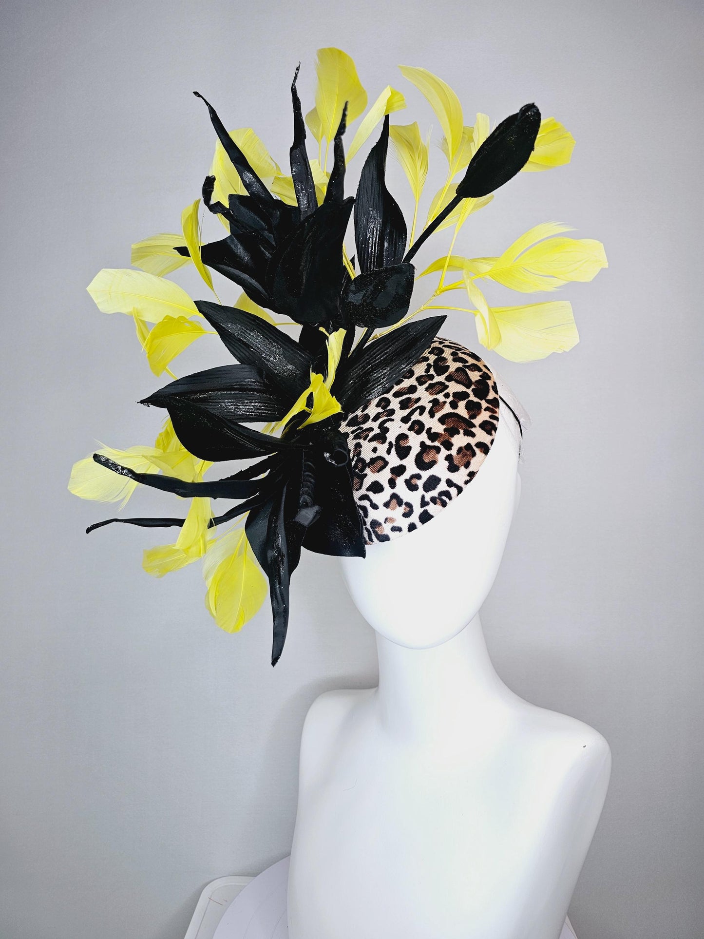 kentucky derby hat fascinator velvet leopard print with black satin flowers and satin black leaves with yellow branching feathers