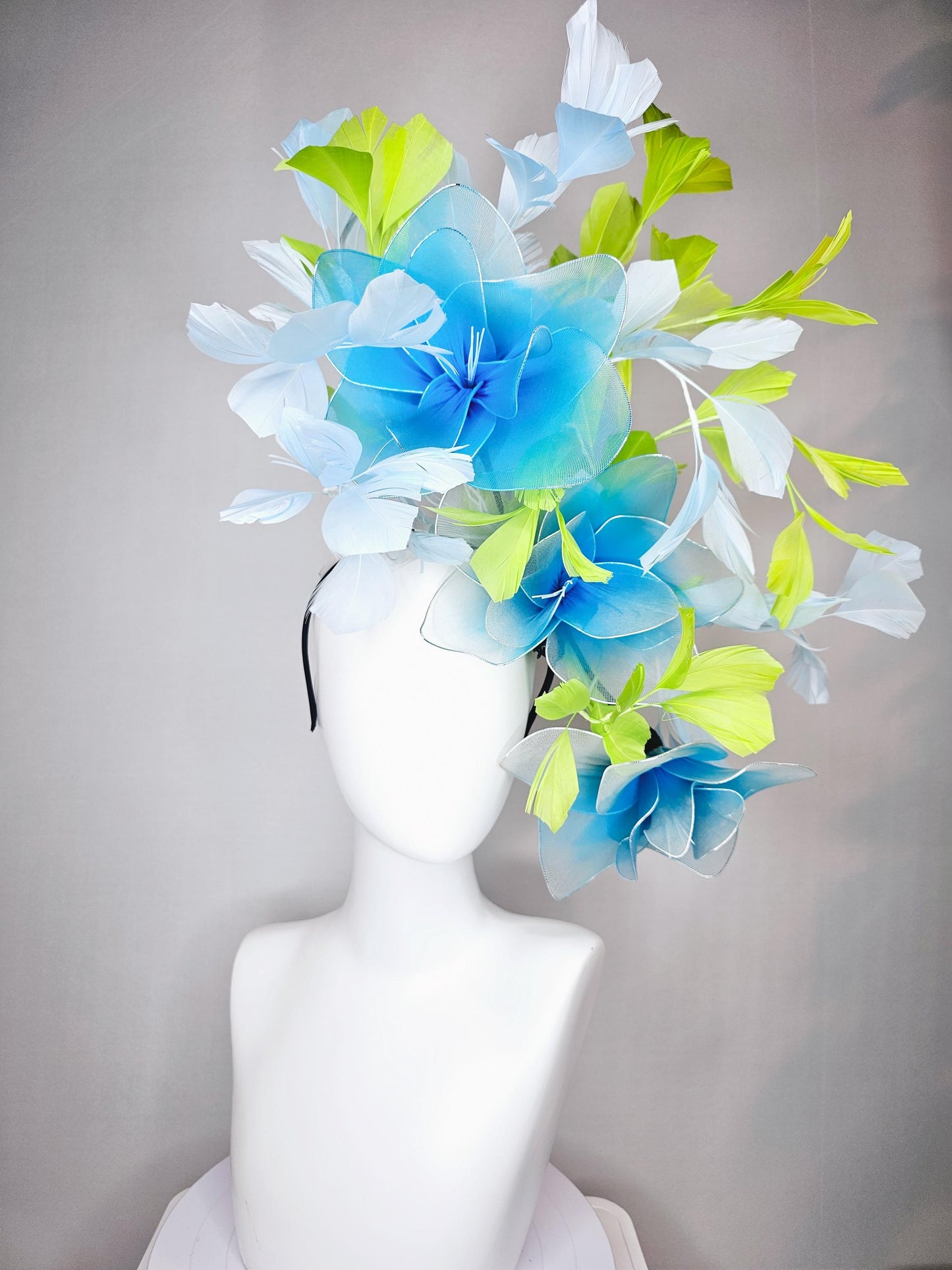 kentucky derby hat fascinator huge wired turquoise blue flowers with light blue and bright green branching feathers