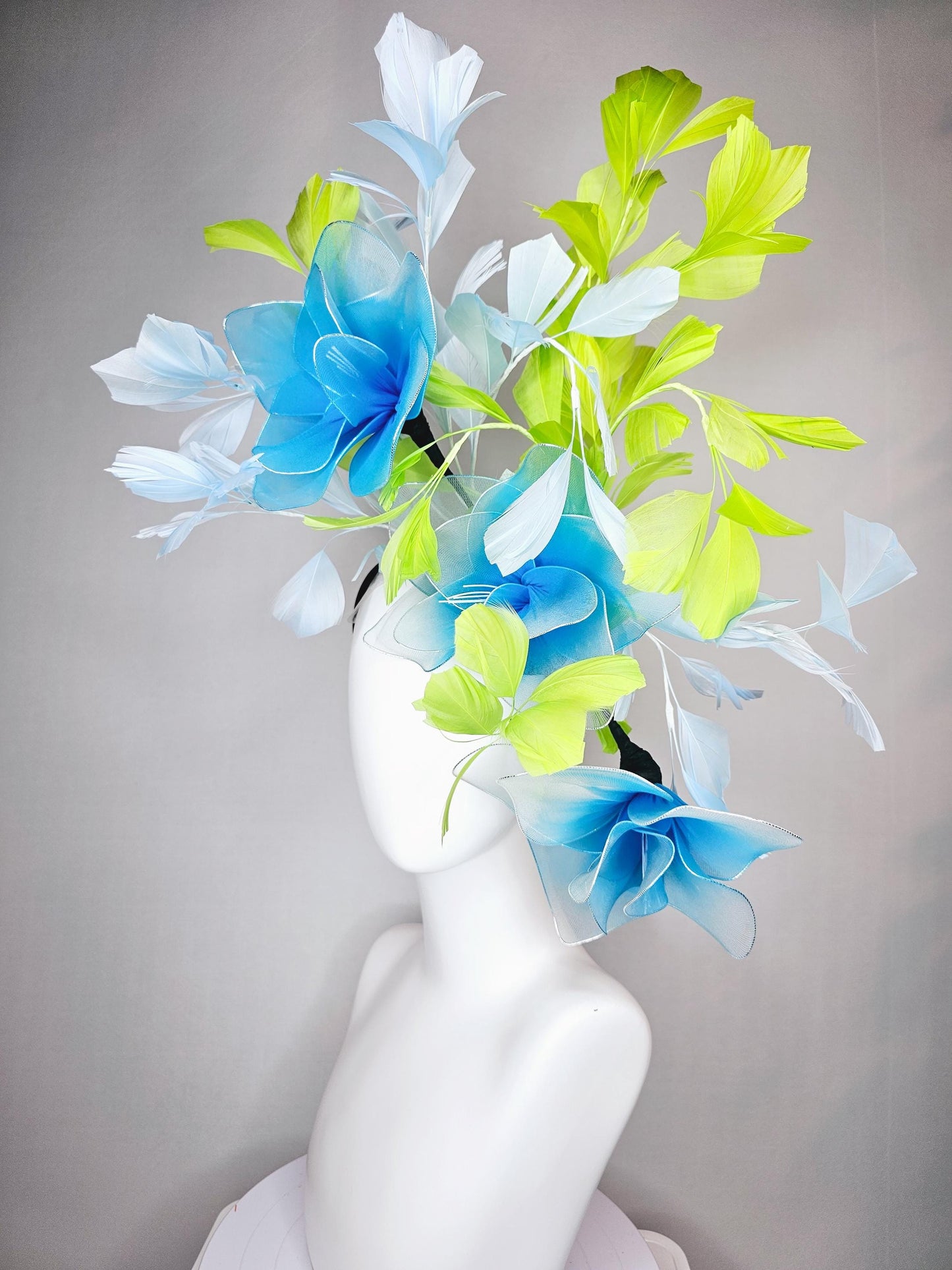 kentucky derby hat fascinator huge wired turquoise blue flowers with light blue and bright green branching feathers