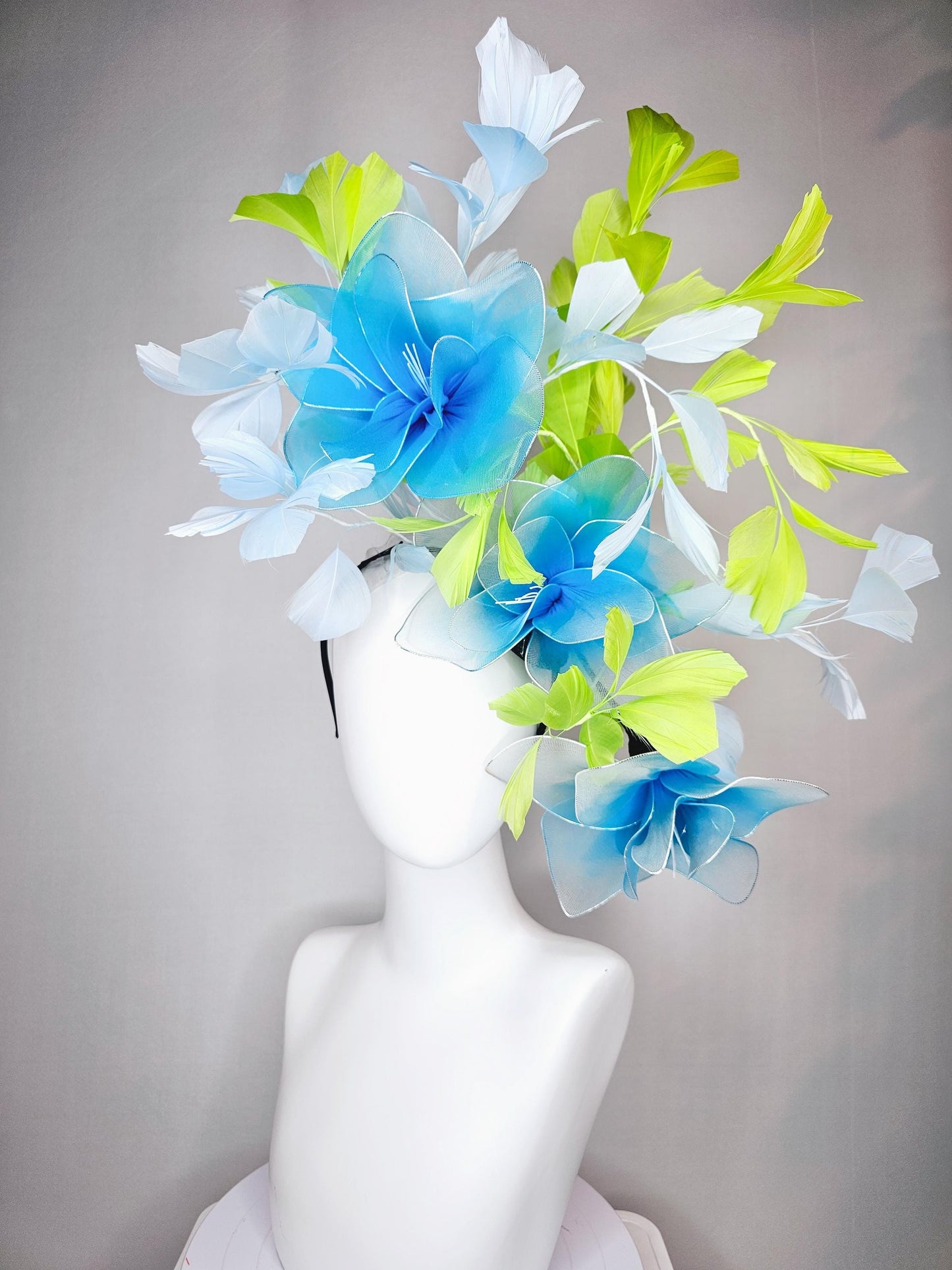 kentucky derby hat fascinator huge wired turquoise blue flowers with light blue and bright green branching feathers