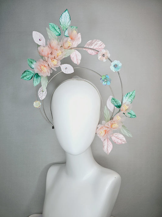 kentucky derby hat fascinator light pink organza flowers baby pink white mint green leaves on tiered silver metallic headband sequin flower