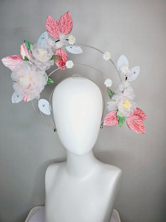 kentucky derby hat fascinator light pink and blue organza flowers dusty pink green leaves on tiered silver metallic headband sequin flower