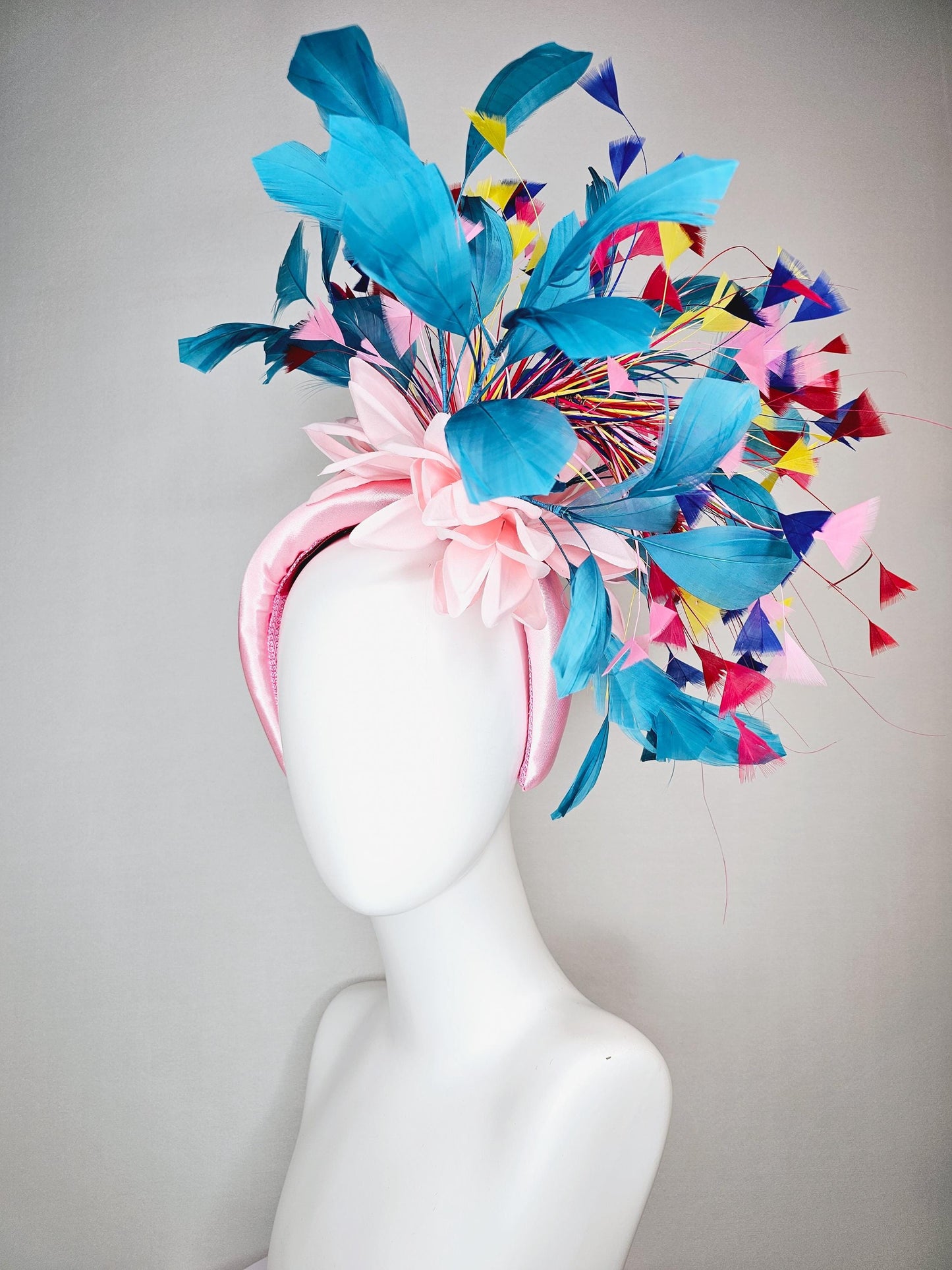 kentucky derby hat fascinator light pink satin headband with satin flower colorful teal royal blue baby pink yellow red branching feathers