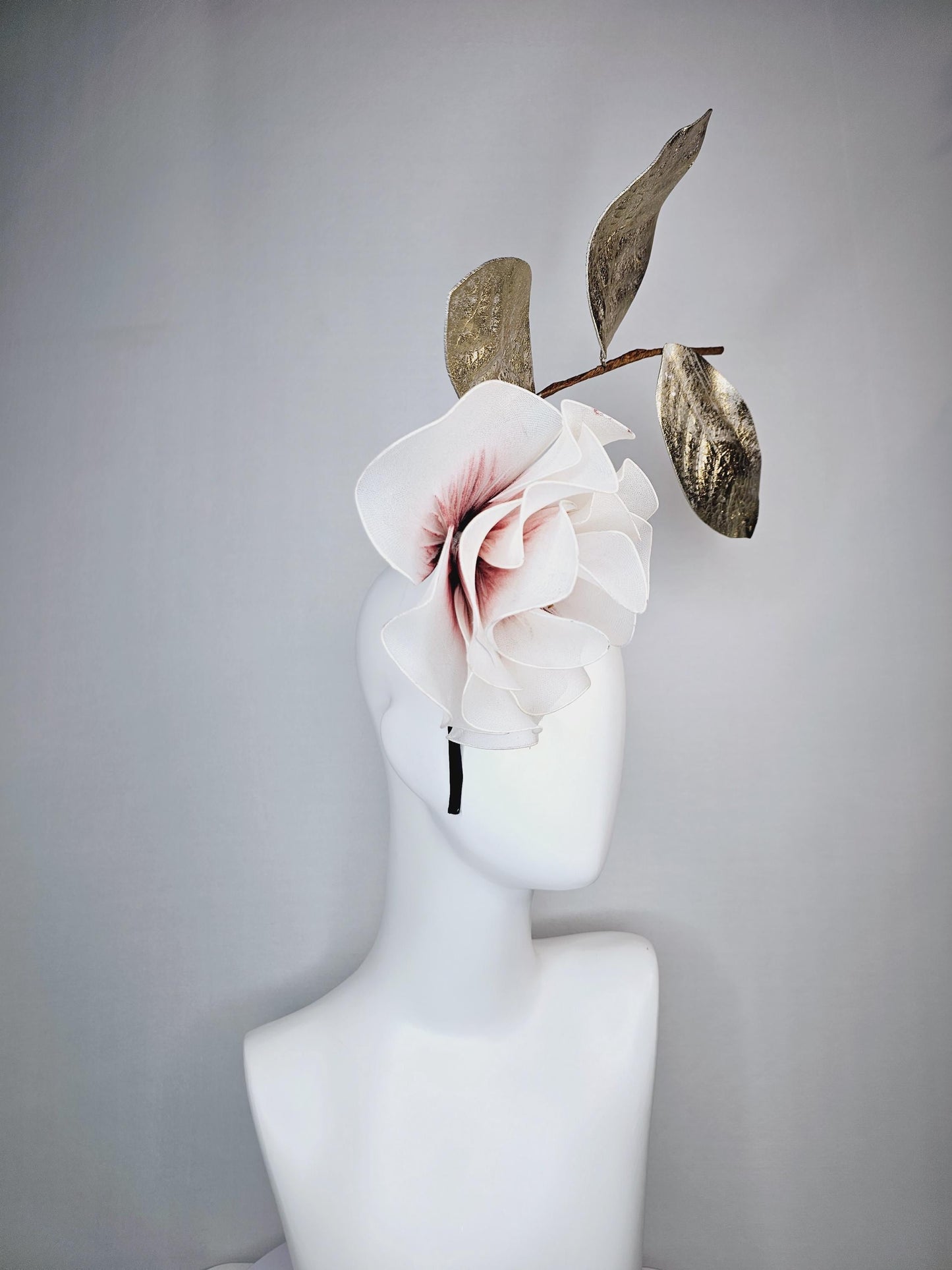 kentucky derby hat fascinator headband with large ivory white wire mesh flower on stem with large gold leaves