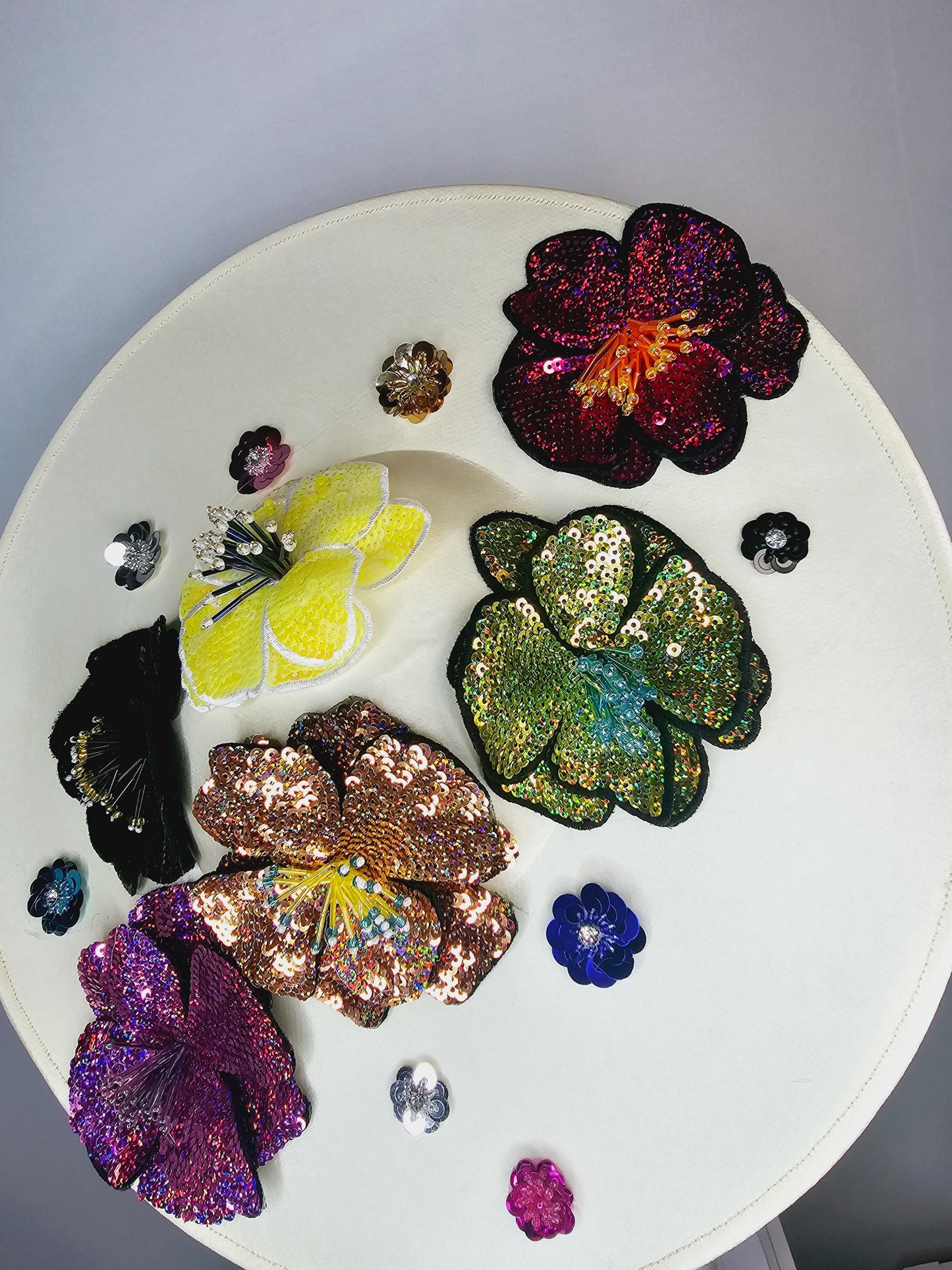 kentucky derby hat fascinator ivory white satin silk saucer with colorful sequin pink black yellow lime green lavender purple beaded flowers