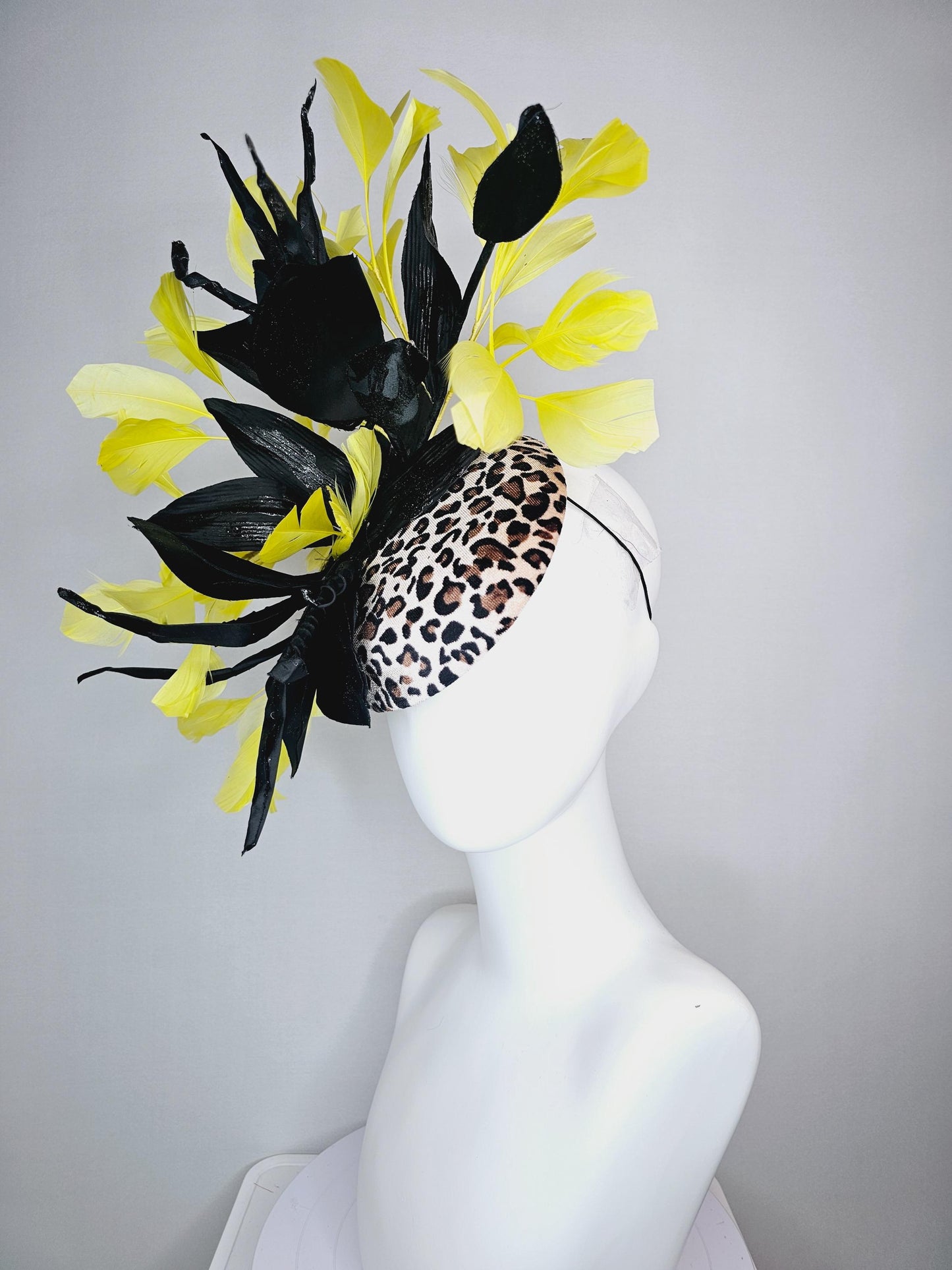 kentucky derby hat fascinator velvet leopard print with black satin flowers and satin black leaves with yellow branching feathers