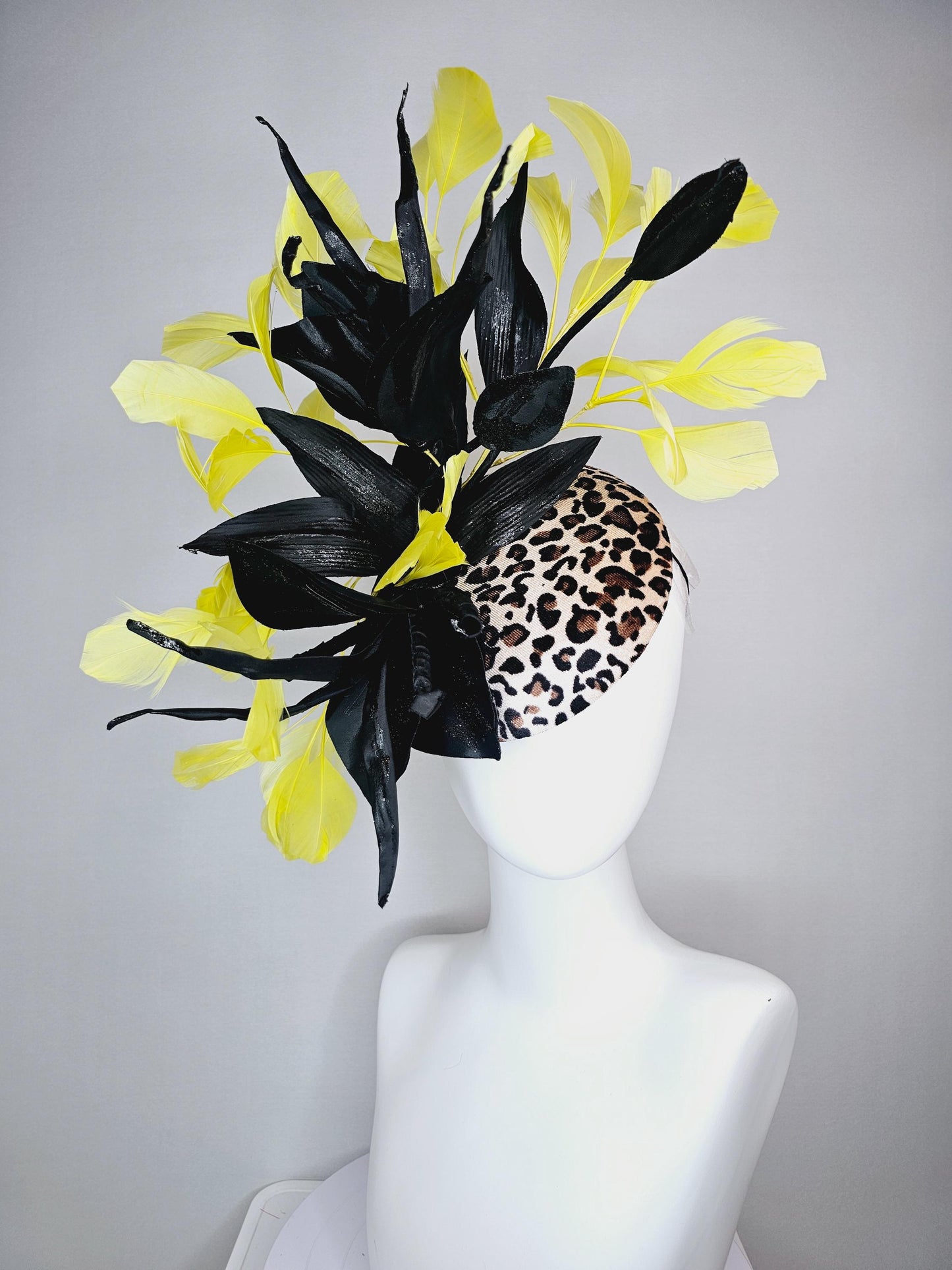 kentucky derby hat fascinator velvet leopard print with black satin flowers and satin black leaves with yellow branching feathers