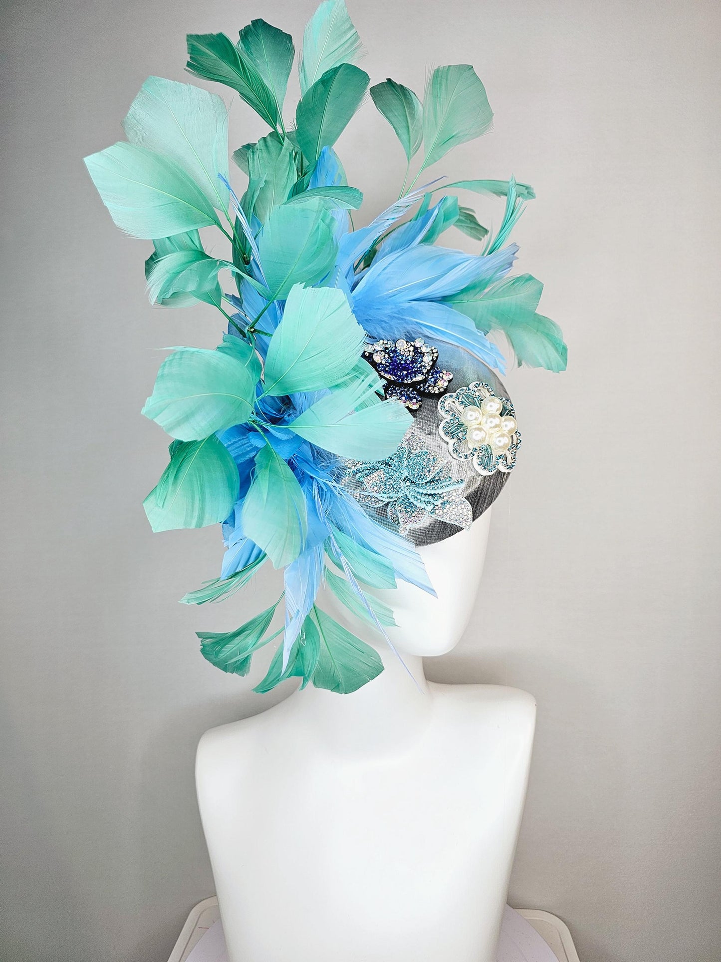 kentucky derby hat fascinator silver metallic with light royal cobalt blue iridescent crystal and pearl flowers mint green sky blue feathers