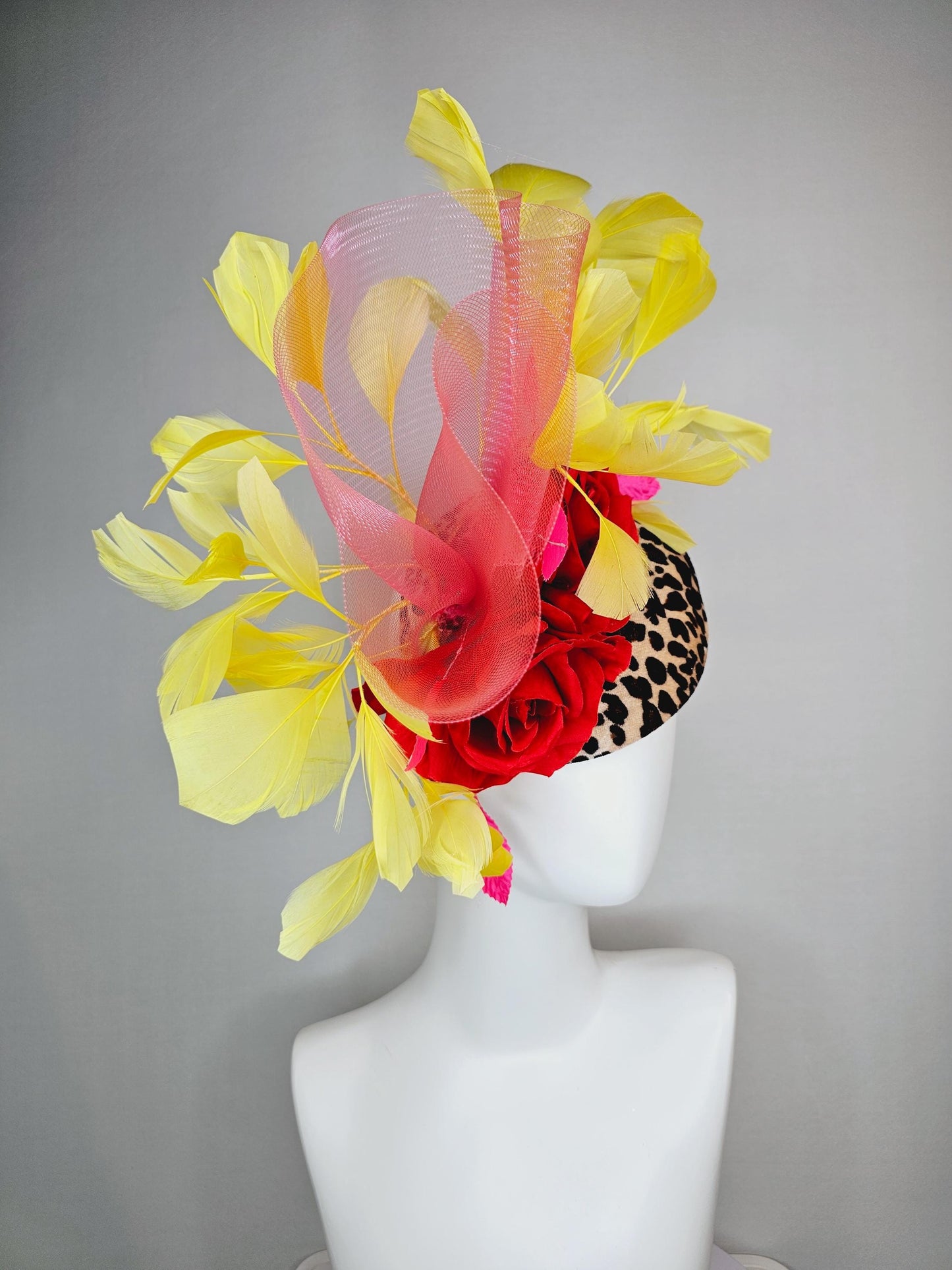kentucky derby hat fascinator velvet leopard print base with red satin roses pink crinoline ruffle pink leaves and yellow branching feathers