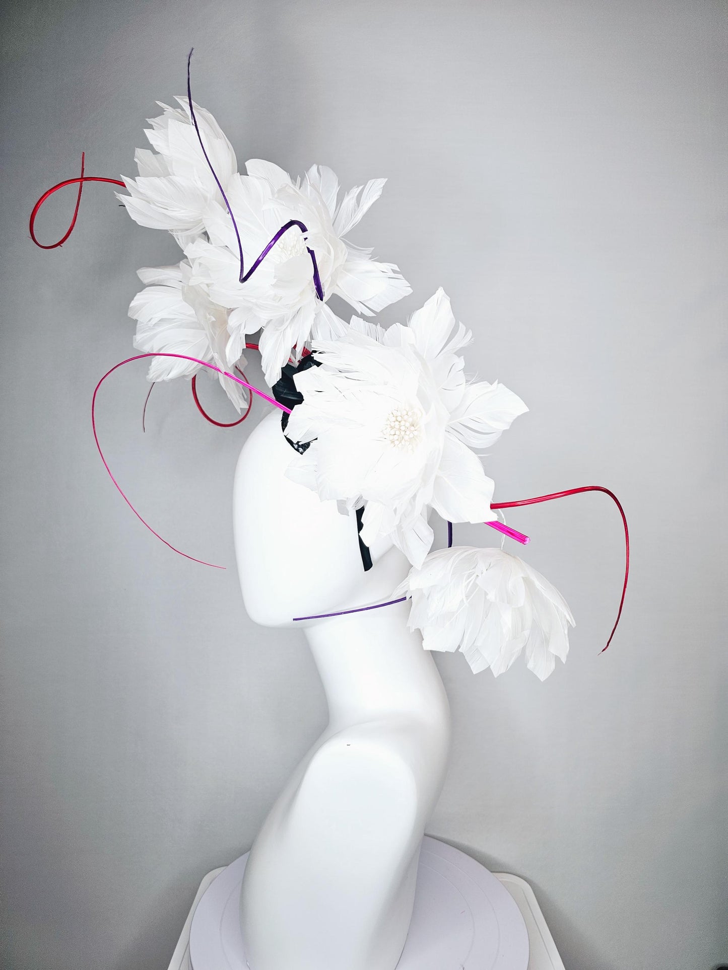 kentucky derby hat fascinator white large fluffy flowers with small black base and large curles purple red pink quills