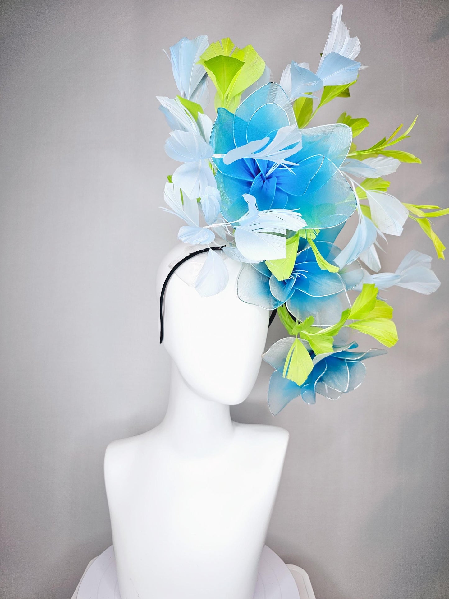 kentucky derby hat fascinator huge wired turquoise blue flowers with light blue and bright green branching feathers