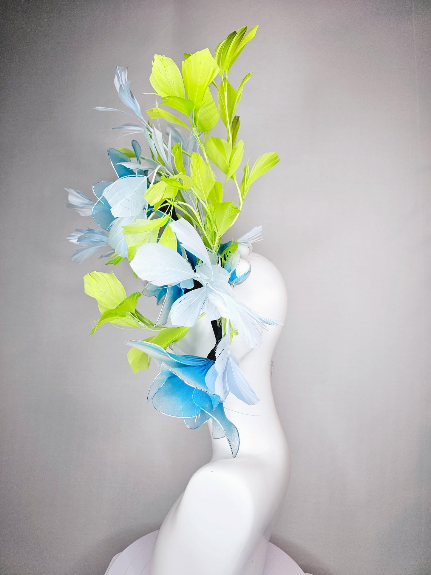 kentucky derby hat fascinator huge wired turquoise blue flowers with light blue and bright green branching feathers