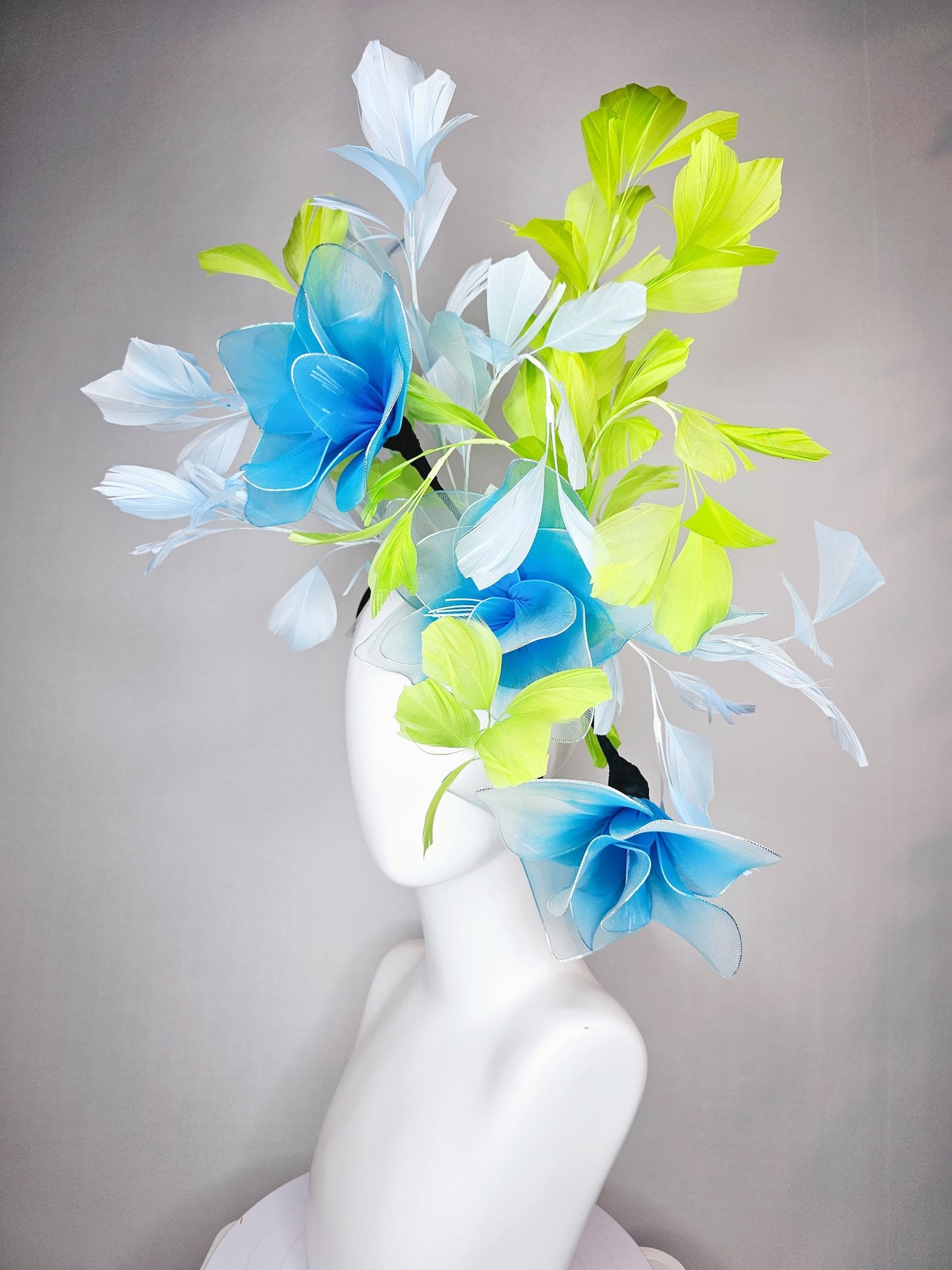 kentucky derby hat fascinator huge wired turquoise blue flowers with light blue and bright green branching feathers