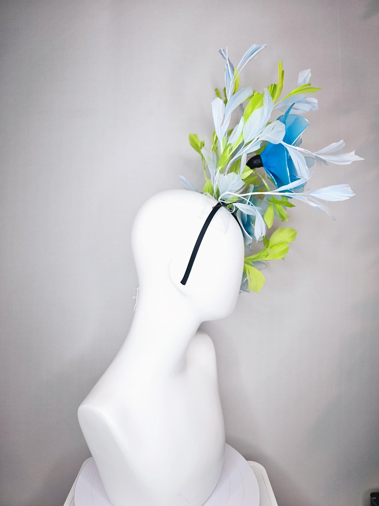 kentucky derby hat fascinator huge wired turquoise blue flowers with light blue and bright green branching feathers