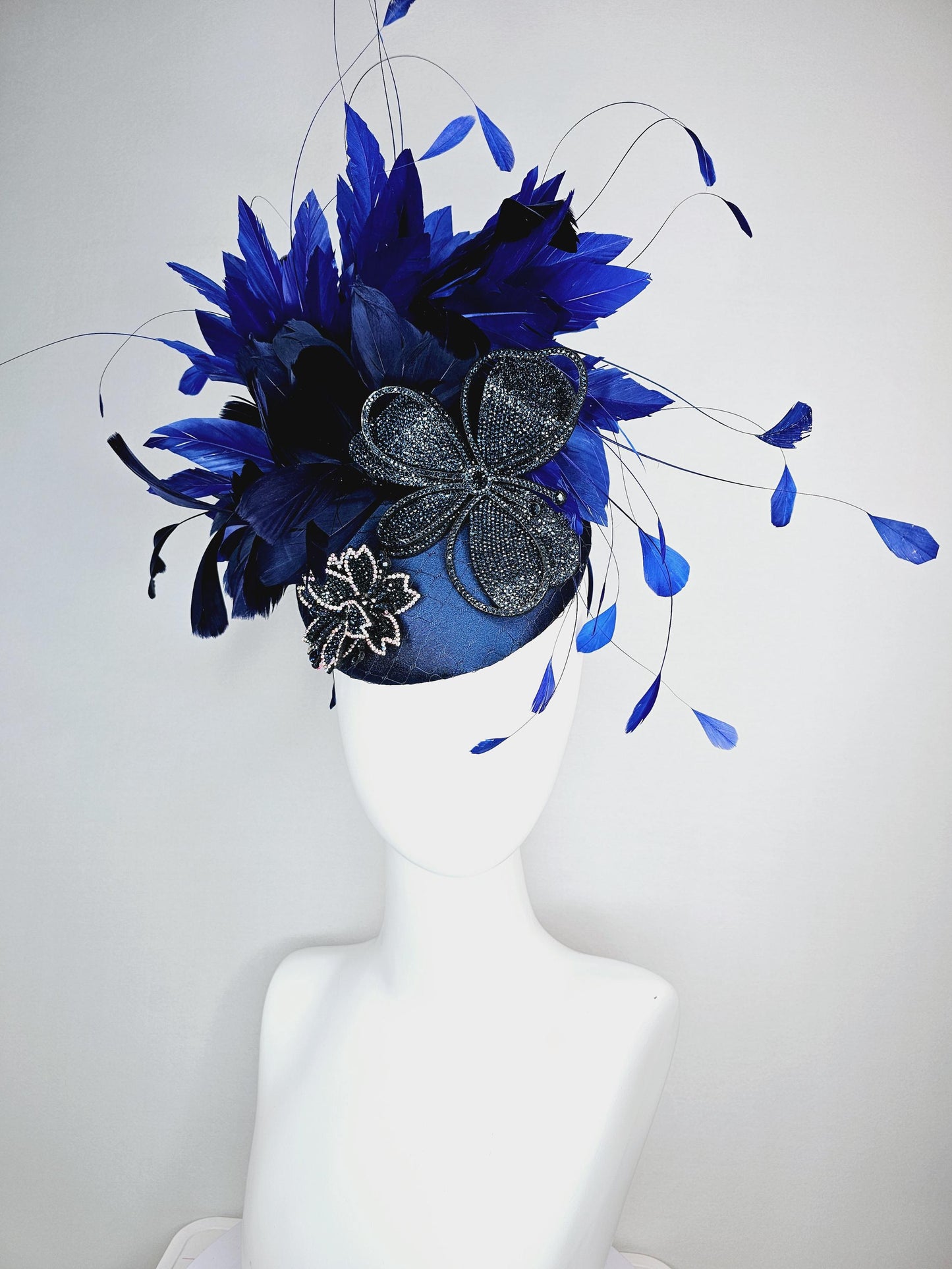 kentucky derby hat fascinator royal blue satin with netting navy blue crystal flowers embroidered navy and cobalt blue branching feathers