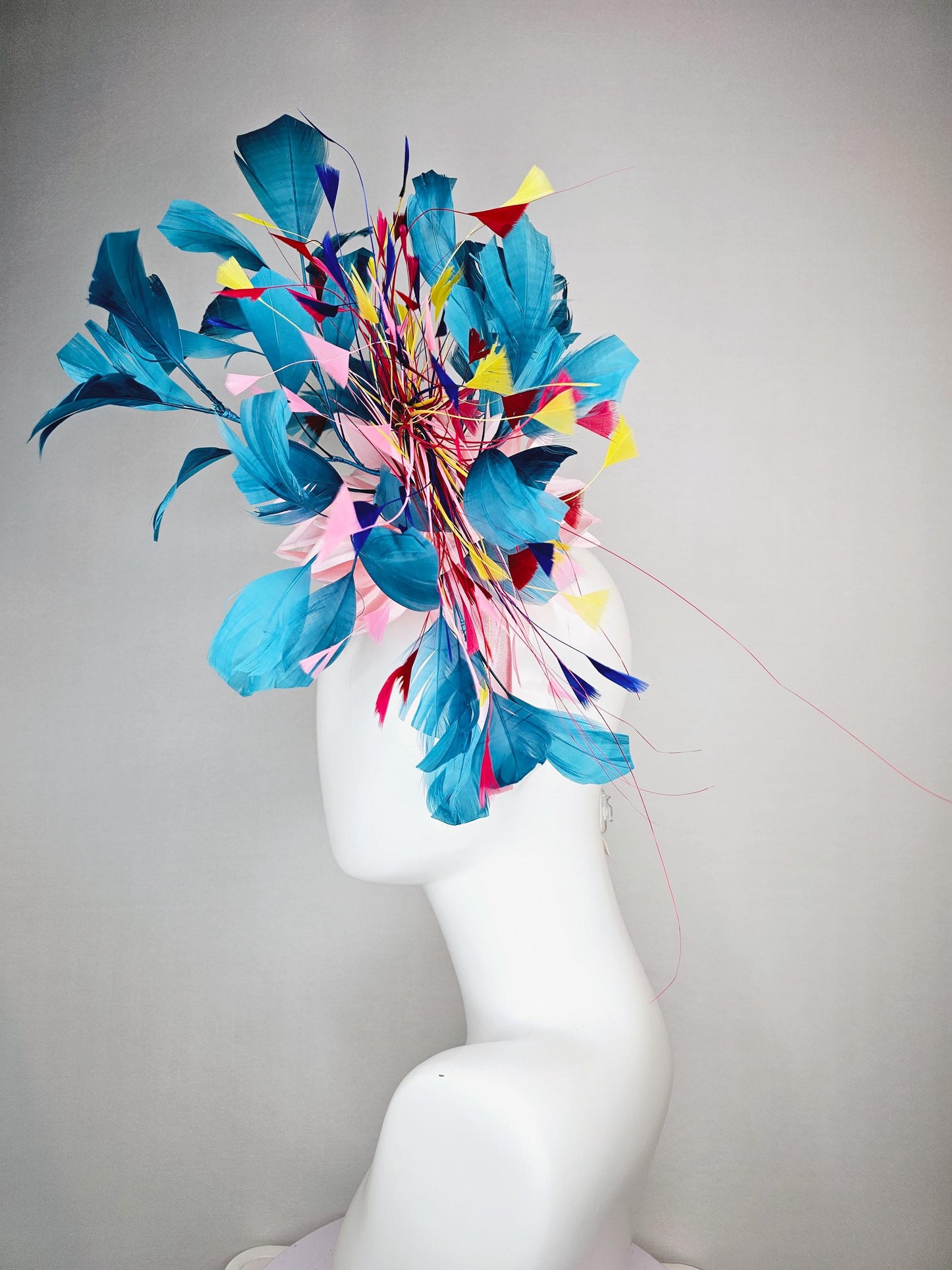 kentucky derby hat fascinator light pink satin headband with satin flower colorful teal royal blue baby pink yellow red branching feathers