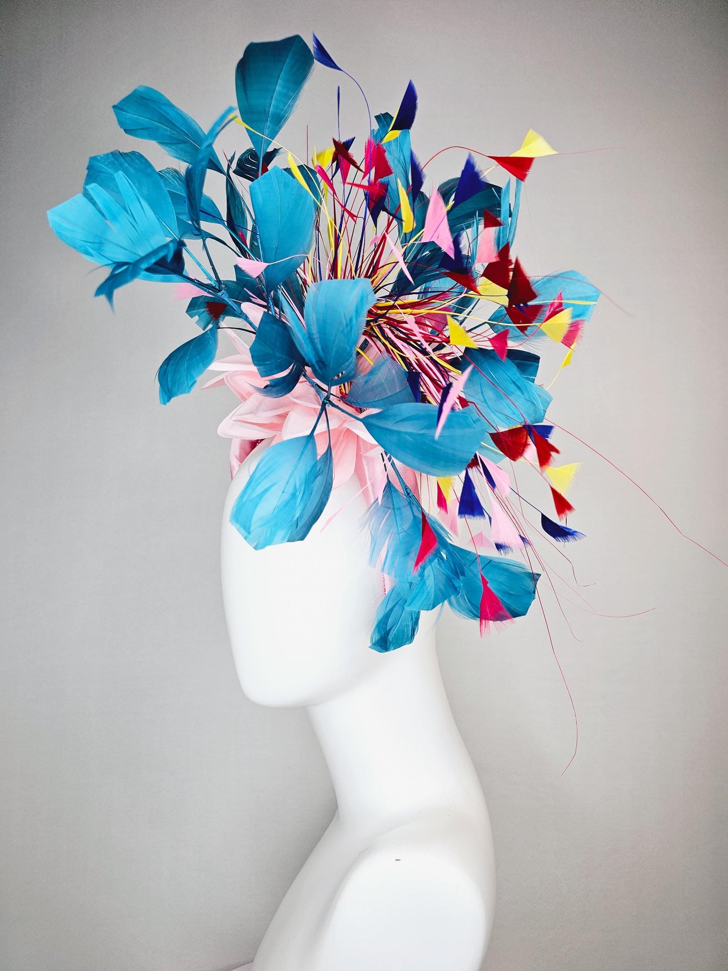 kentucky derby hat fascinator light pink satin headband with satin flower colorful teal royal blue baby pink yellow red branching feathers