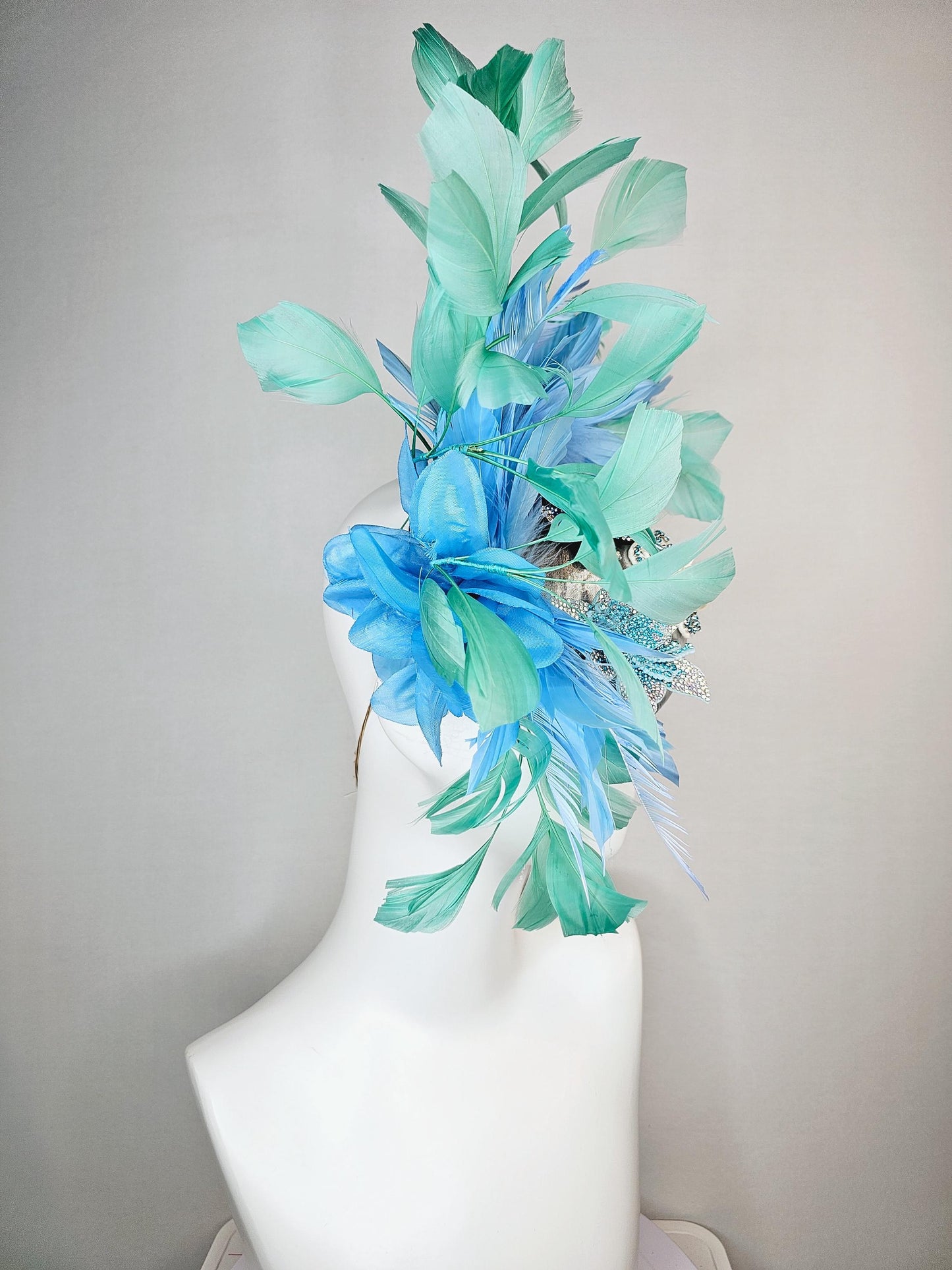 kentucky derby hat fascinator silver metallic with light royal cobalt blue iridescent crystal and pearl flowers mint green sky blue feathers