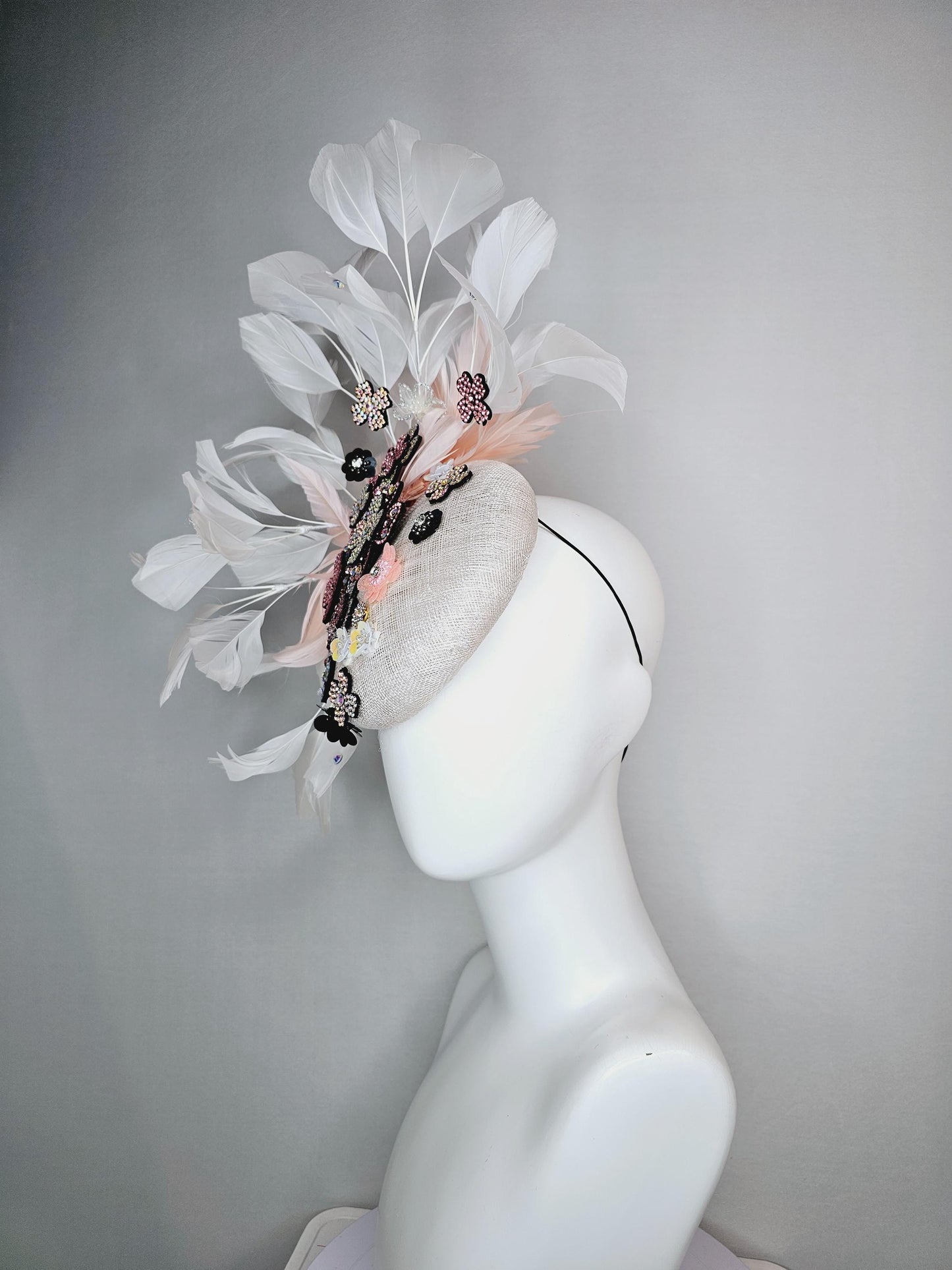 kentucky derby hat fascinator white sinamay with light pink iridescent swarovski crystal and black sequin flowers baby pink white feathers