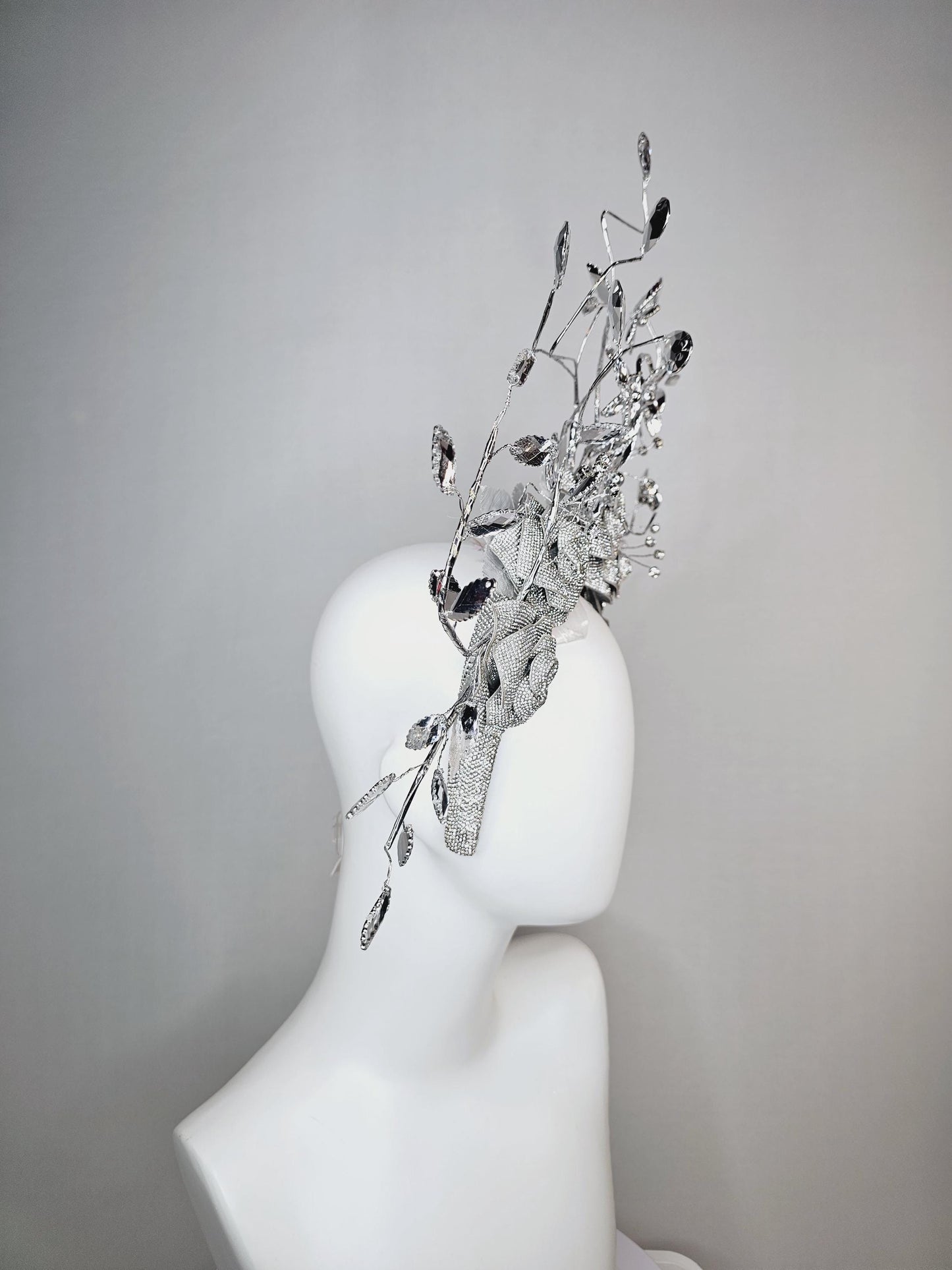 kentucky derby hat fascinator clear swarovski crystal headband with silver large flowers and rhinestone leaves