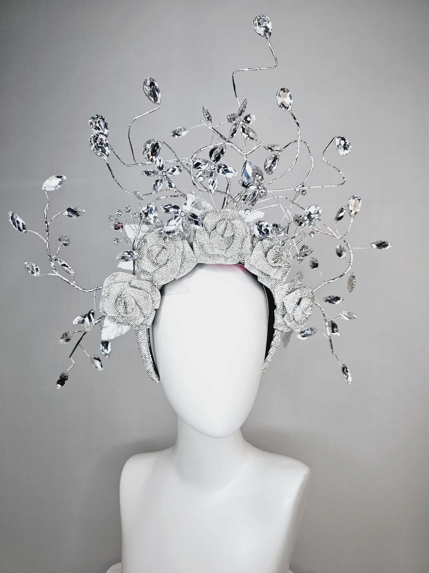 kentucky derby hat fascinator clear swarovski crystal headband with silver large flowers and rhinestone leaves