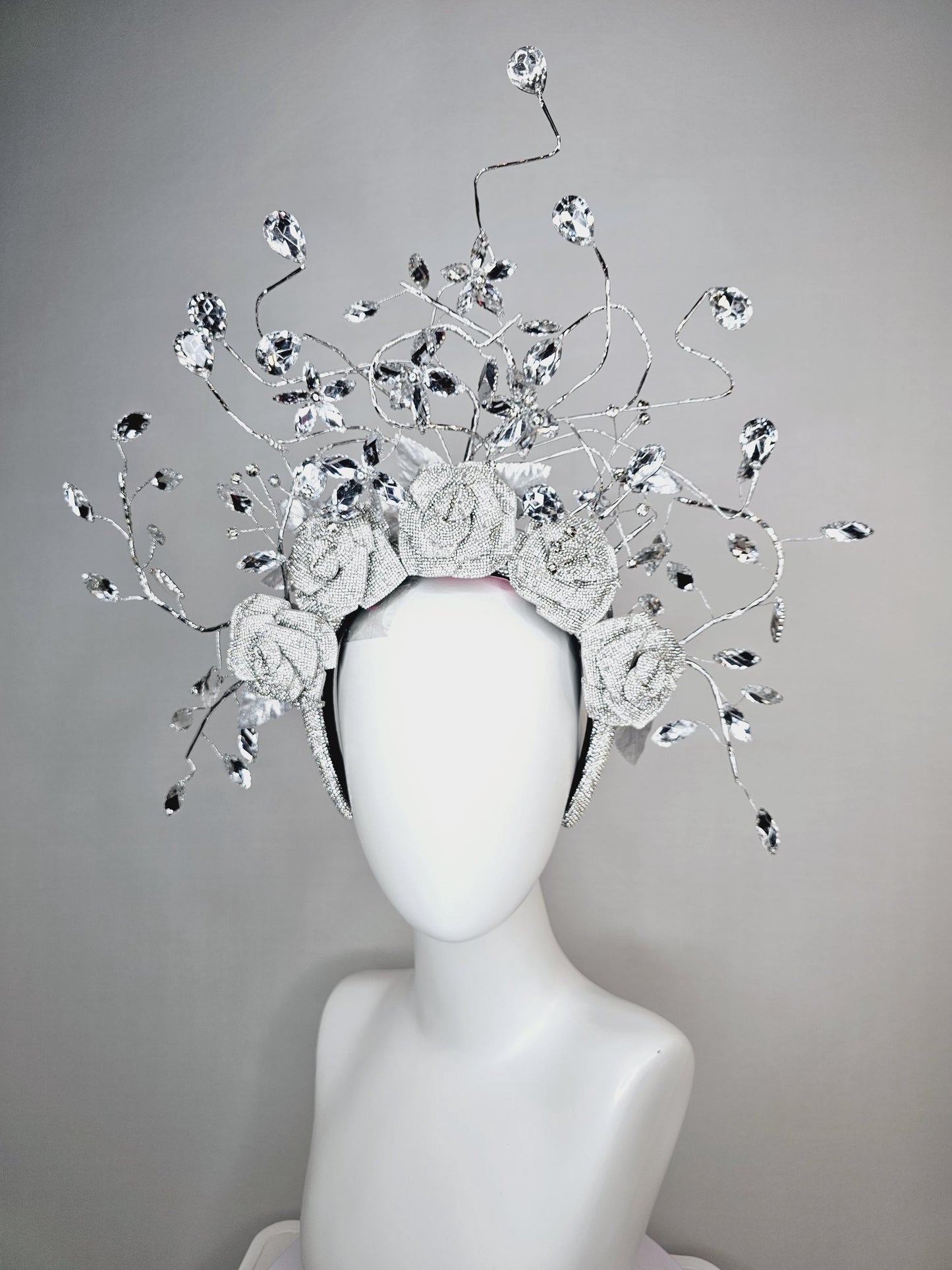 kentucky derby hat fascinator clear swarovski crystal headband with silver large flowers and rhinestone leaves