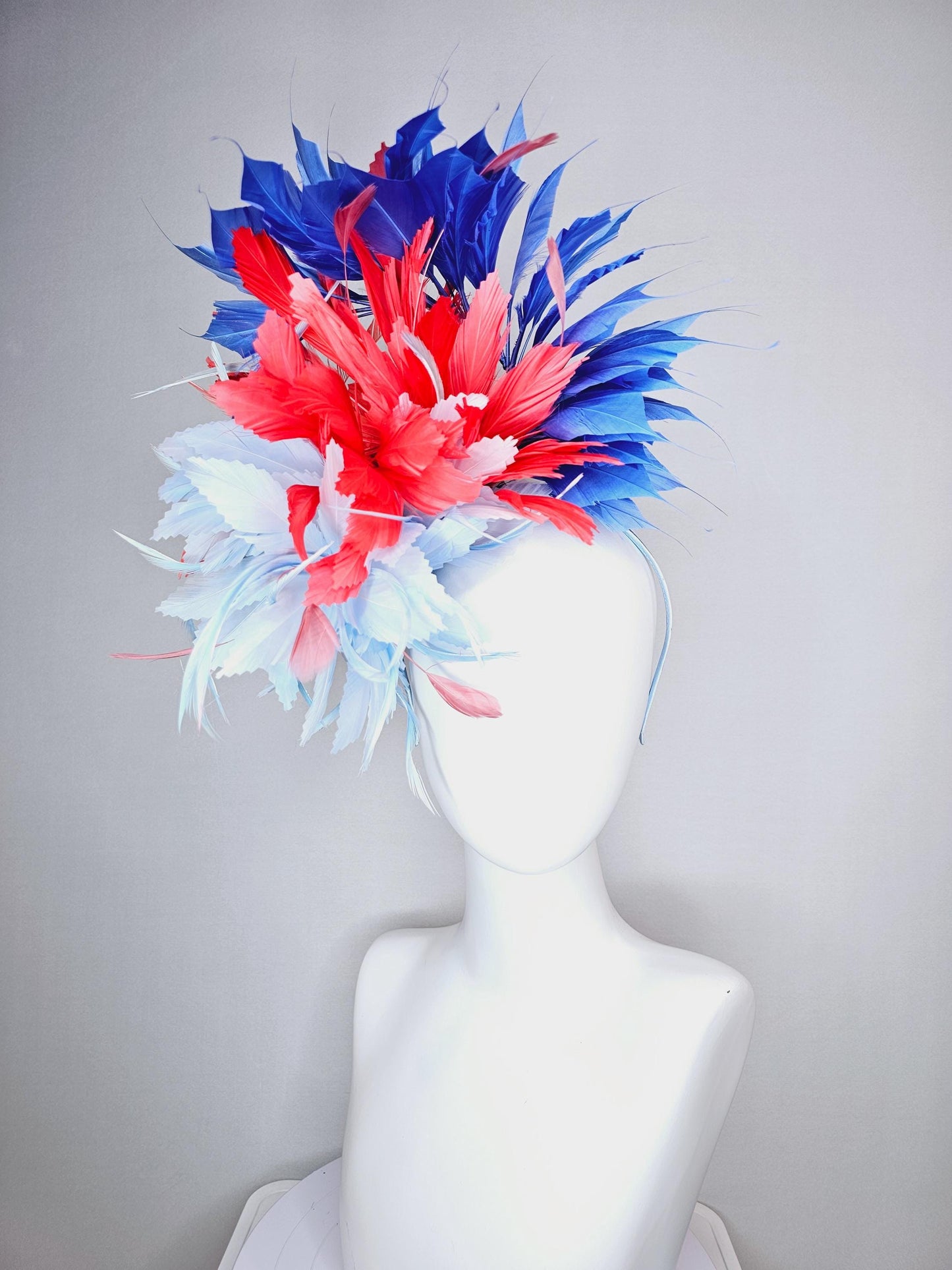 kentucky derby hat fascinator fluffy light blue zigzag feather flower and coral red royal cobalt blue baby blue branching feathers