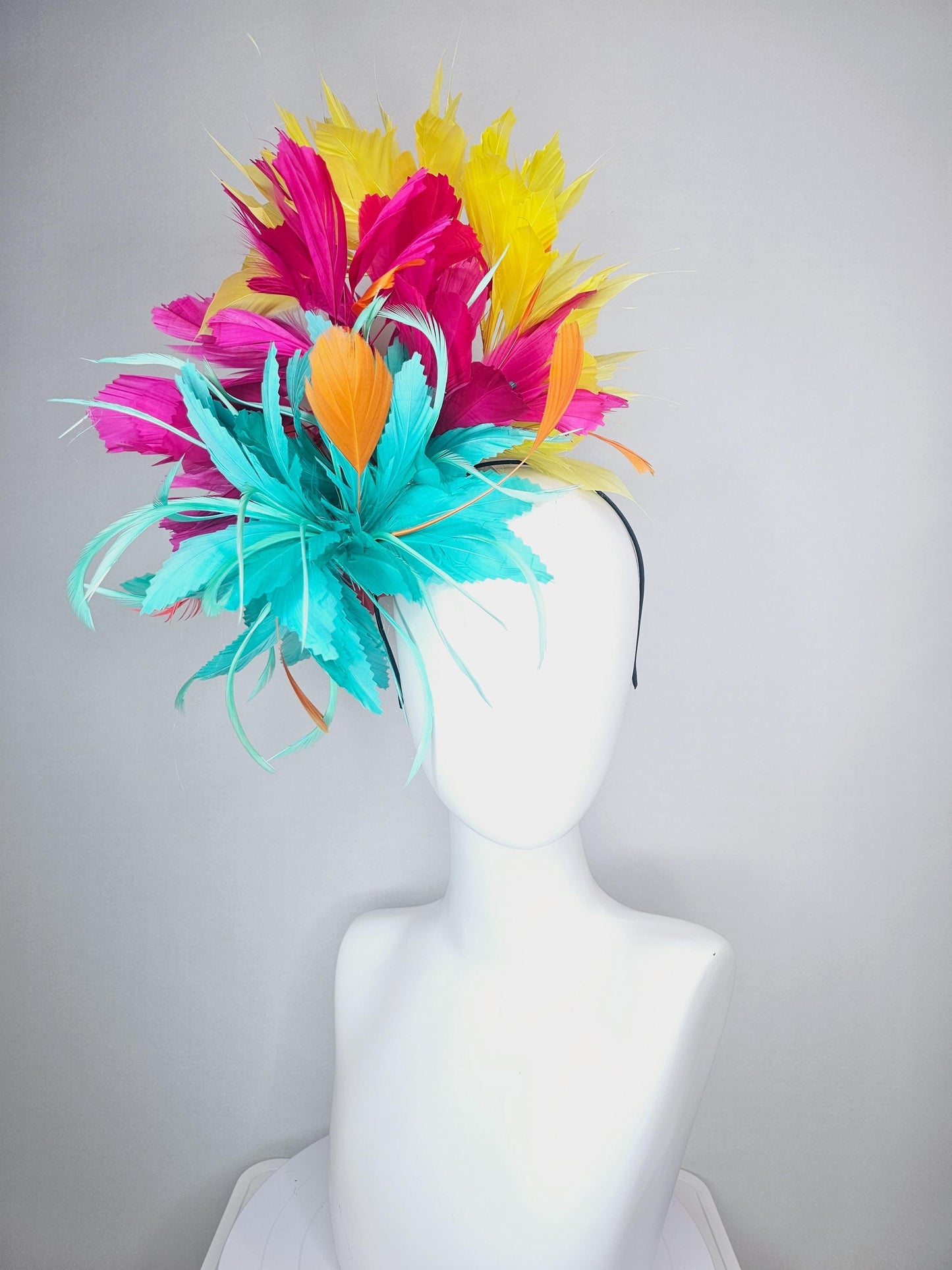 kentucky derby hat fascinator colorful fluffy aqua blue zigzag feather flower and hot pink fuchsia cherry red yellow branching feathers