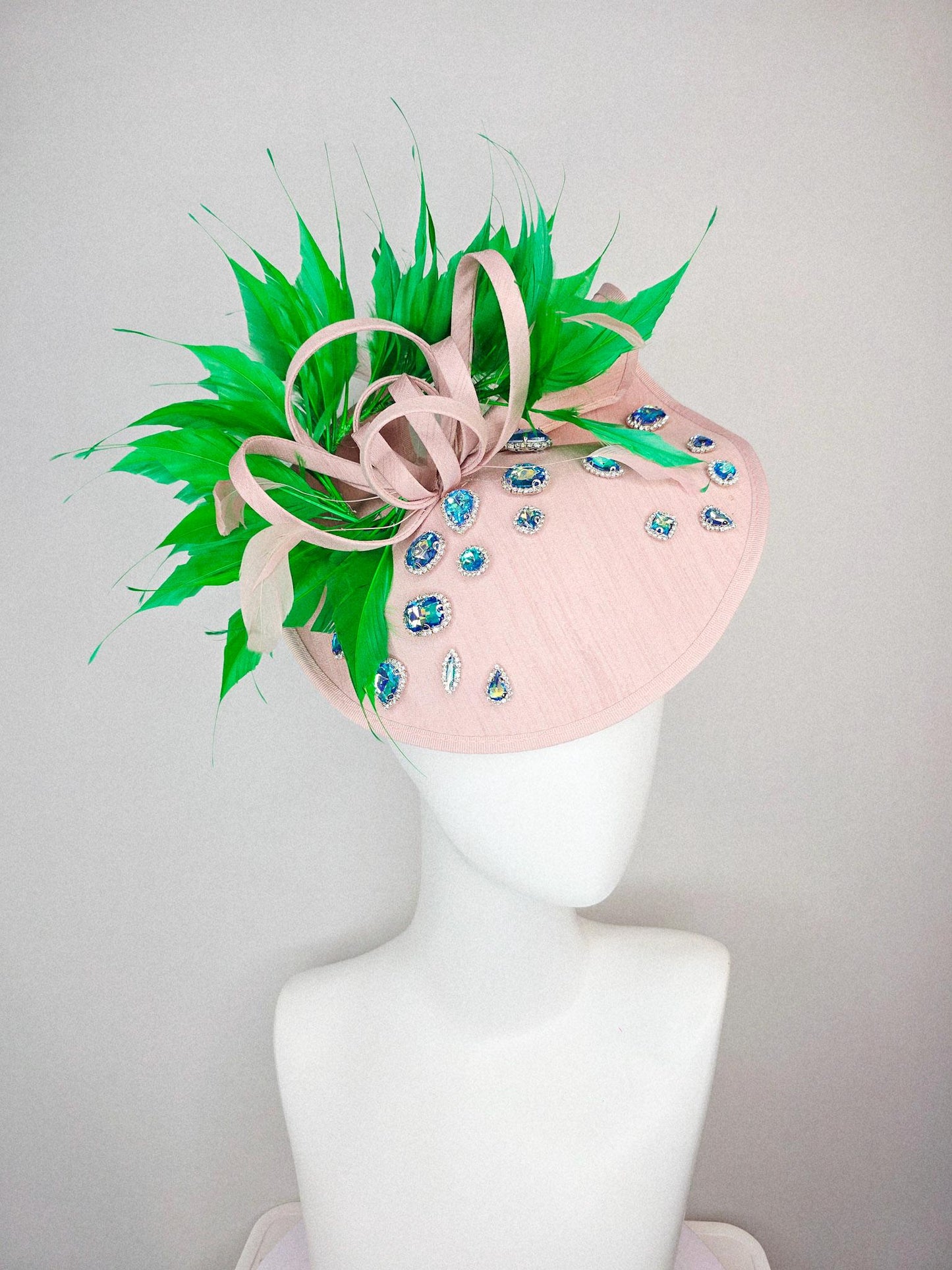 kentucky derby hat fascinator light pink shantung saucer with iridescent blue crystal rhinestone jewels shantung bow lime green feathers