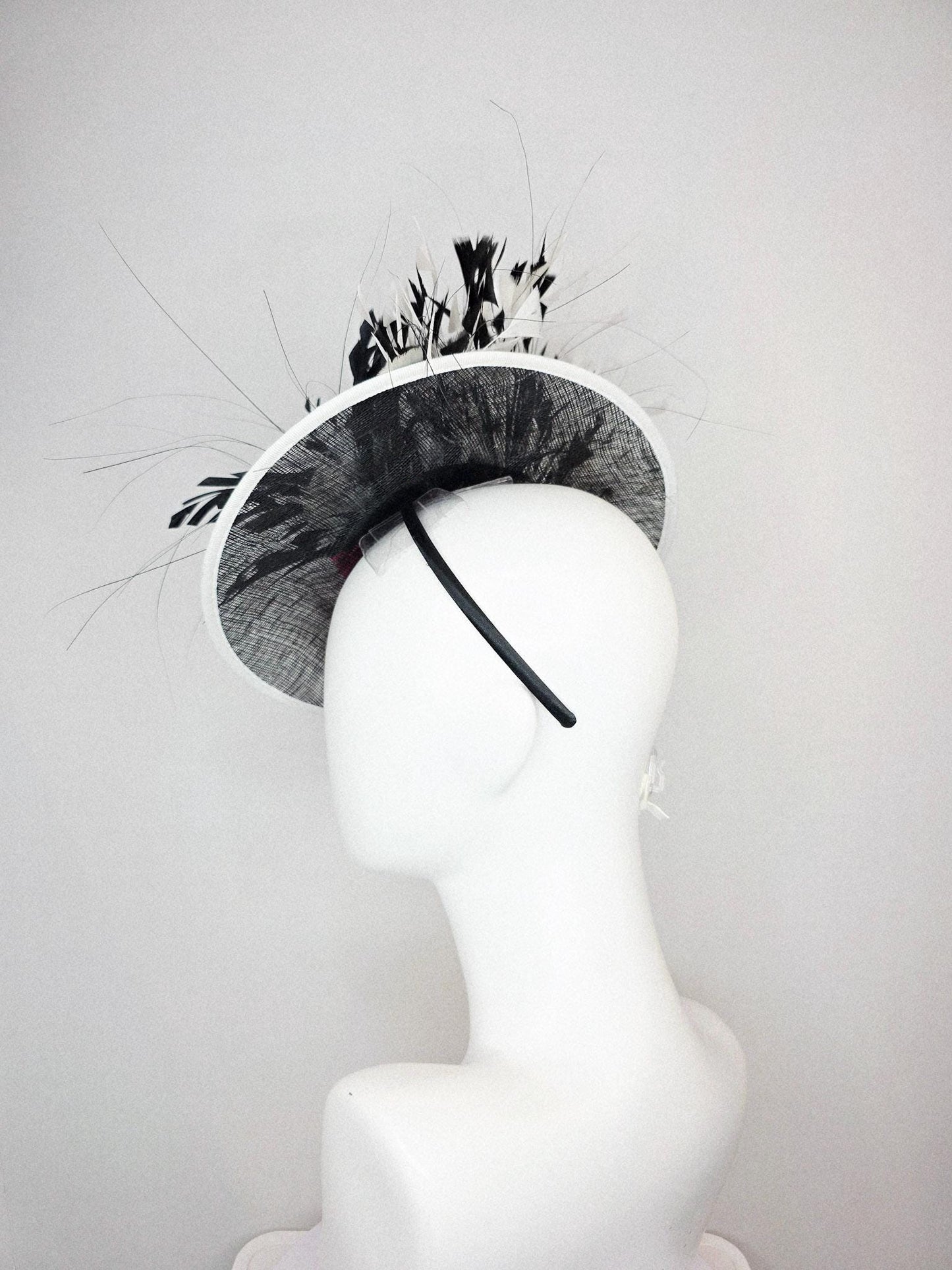 kentucky derby hat fascinator black and white sinamay saucer with white sinamay trim pink feather flower black and white branching feathers