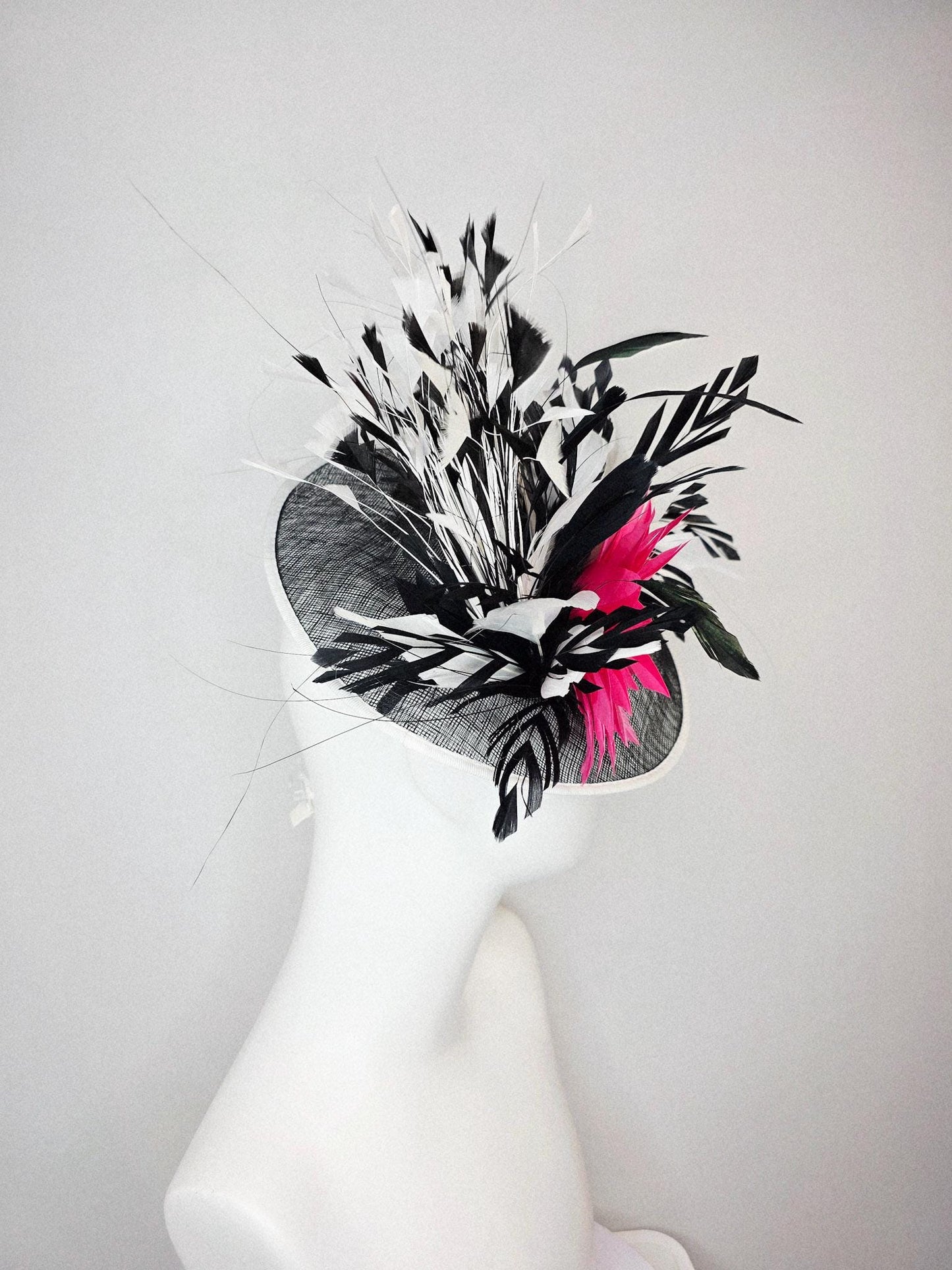 kentucky derby hat fascinator black and white sinamay saucer with white sinamay trim pink feather flower black and white branching feathers