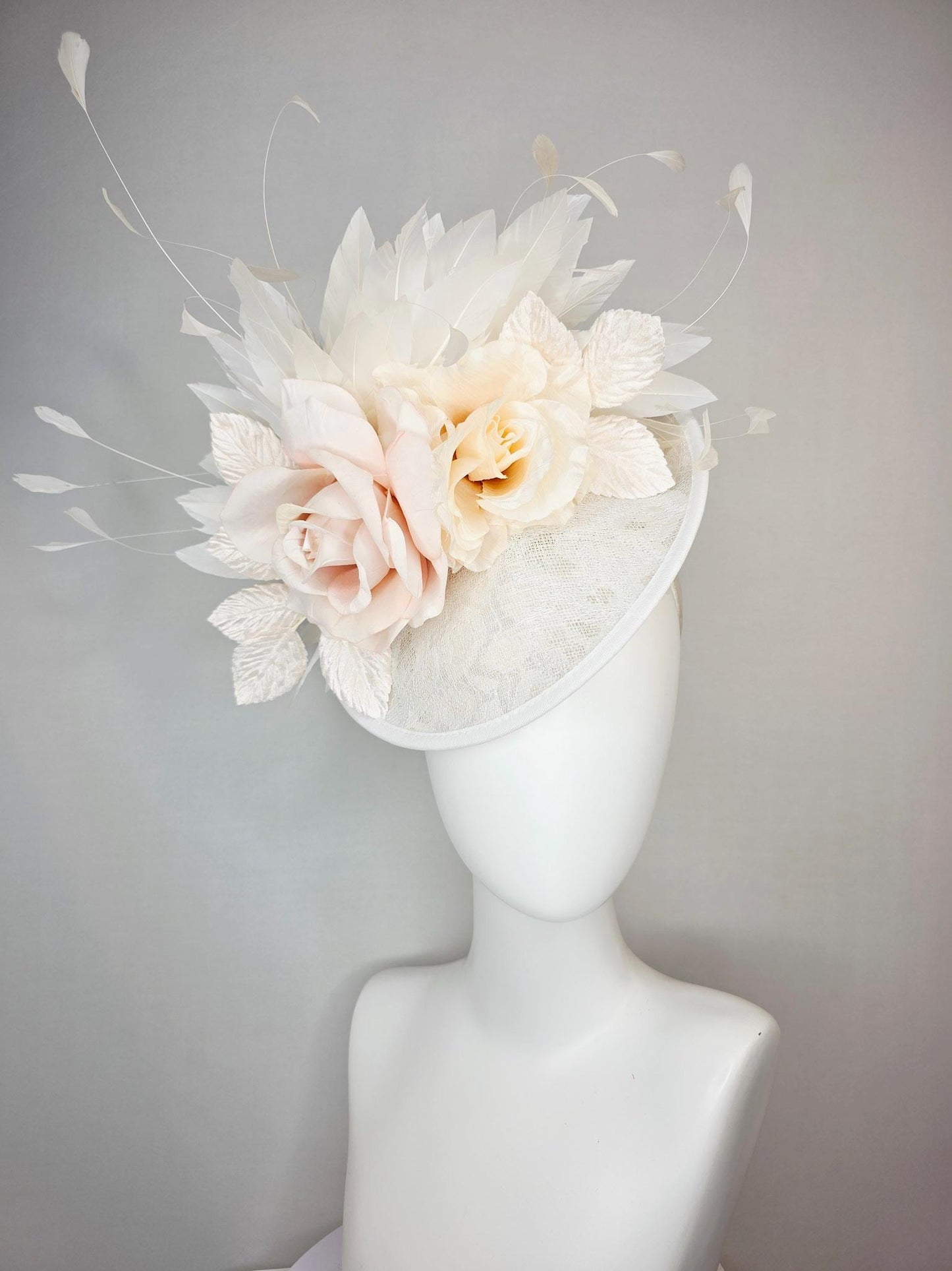 kentucky derby hat fascinator neutral ivory white sinamay saucer with champagne pink and cream organza roses with leaves and white feathers