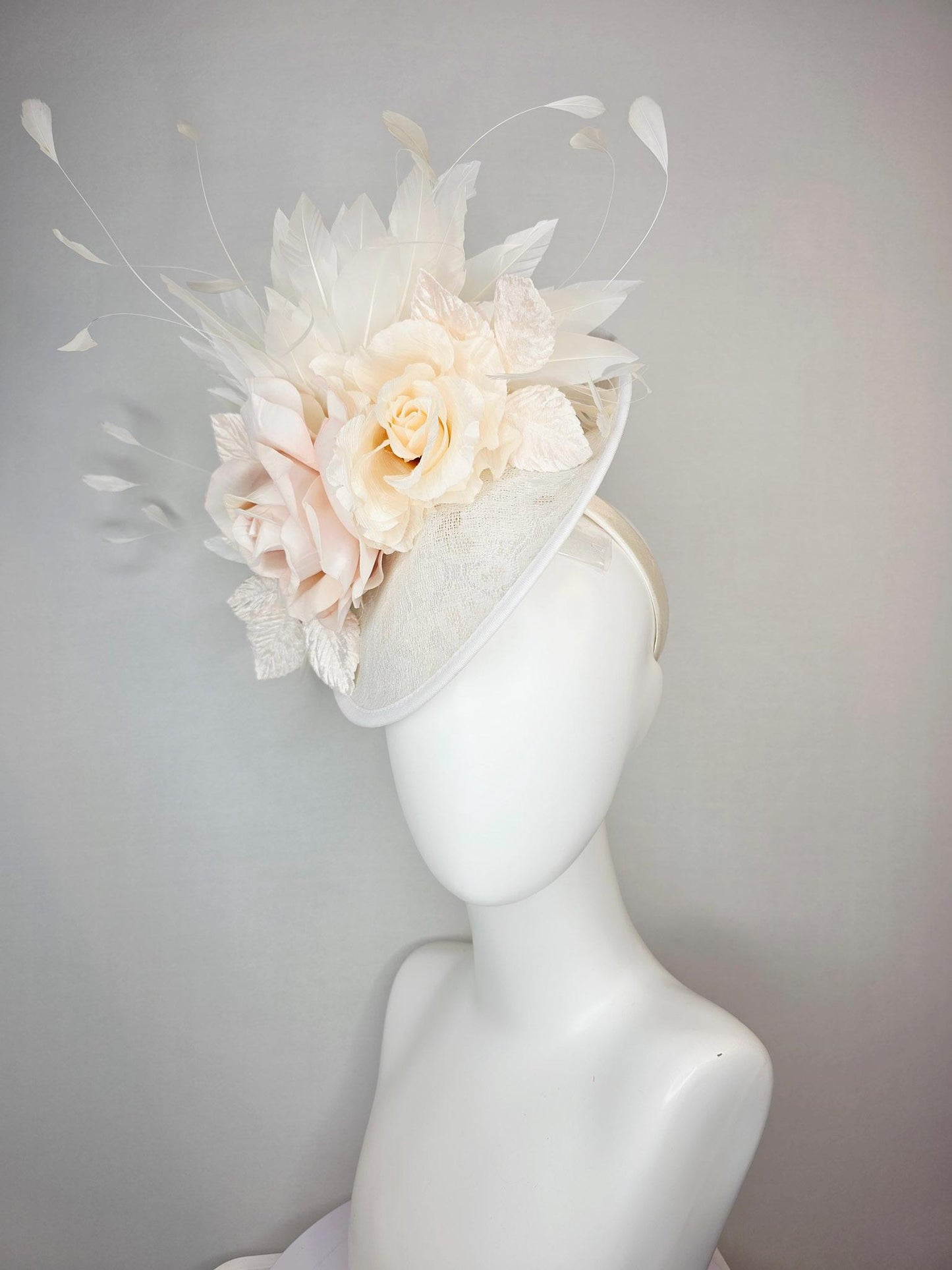 kentucky derby hat fascinator neutral ivory white sinamay saucer with champagne pink and cream organza roses with leaves and white feathers