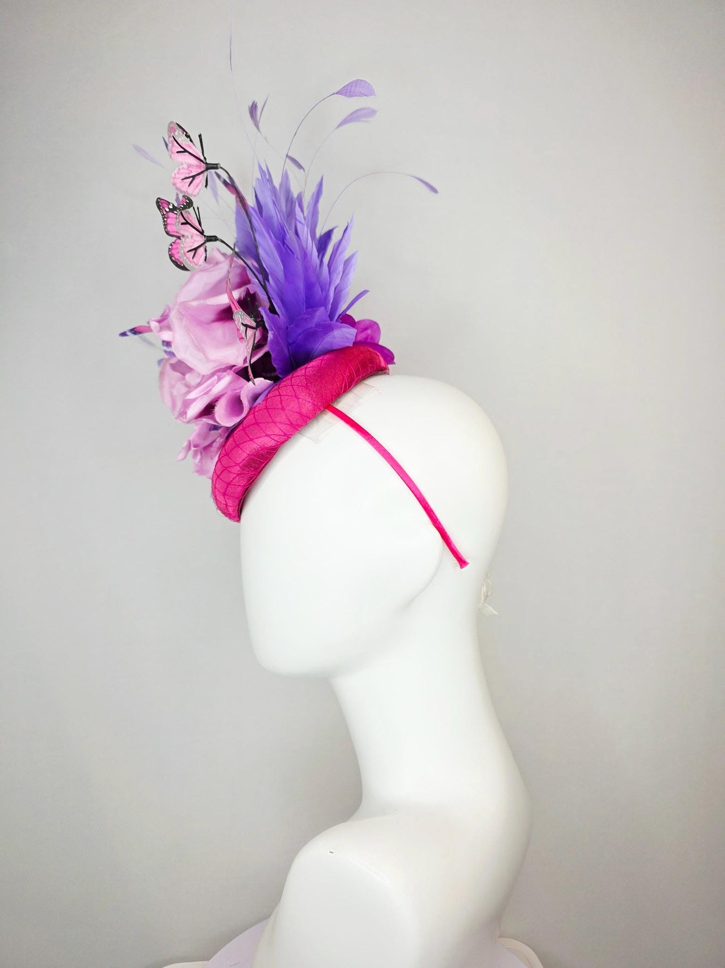 kentucky derby hat fascinator pink satin with netting large lilac purple satin flower lavender purple feathers and pink butterflies