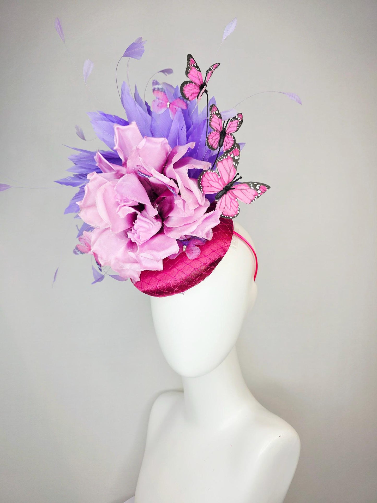 kentucky derby hat fascinator pink satin with netting large lilac purple satin flower lavender purple feathers and pink butterflies
