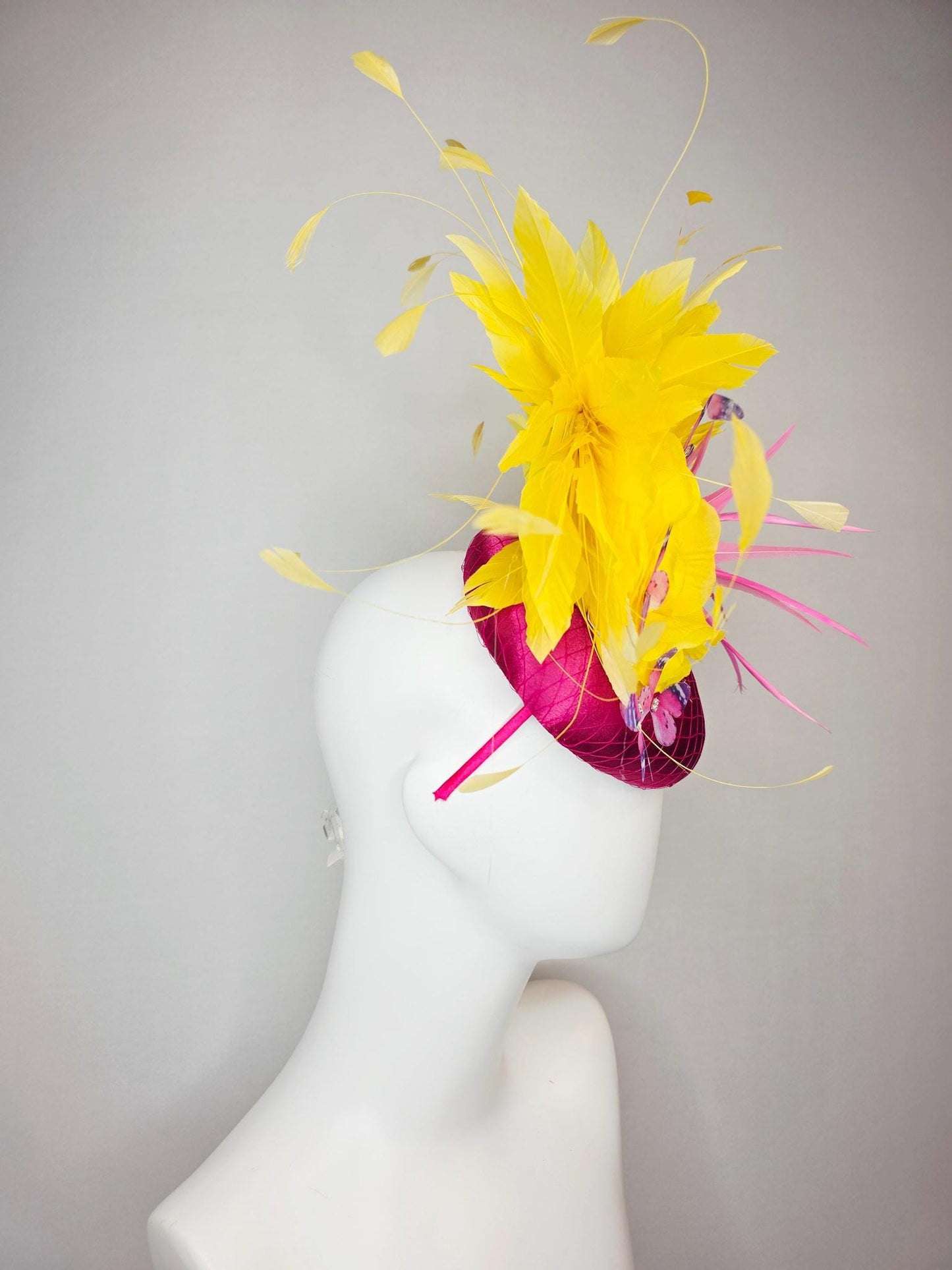 kentucky derby hat fascinator hot pink satin with netting yellow satin rose white leaves pink feather flower yellow feathers and butterflies