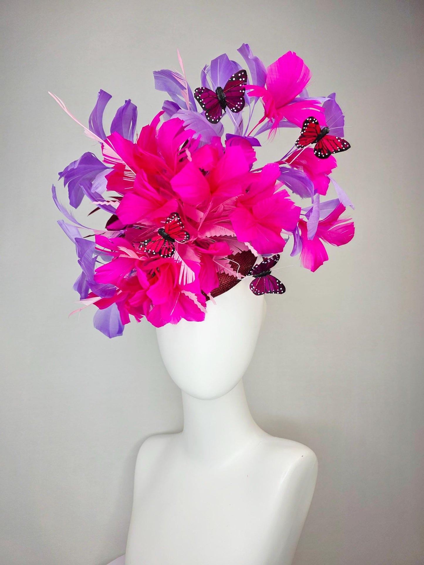 kentucky derby hat fascinator burgundy red sinamay fuchsia pink lavender purple branching feathers red and dark pink butterflies