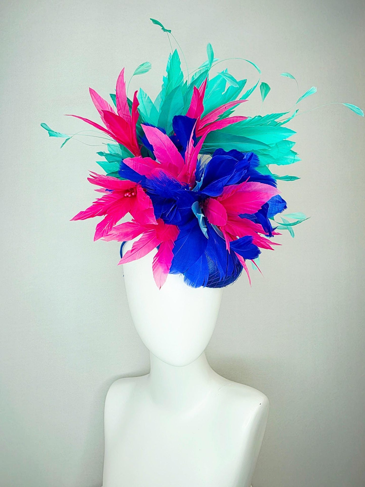 kentucky derby hat fascinator cobalt royal blue satin with netting pink feather flowers cobalt blue and mint aqua green branching feathers