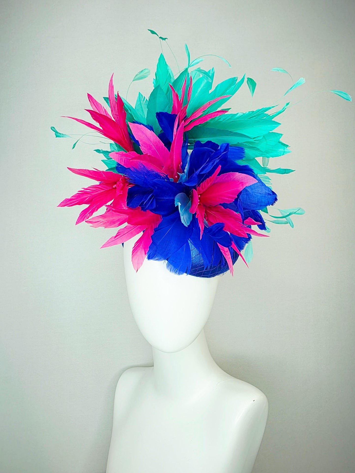 kentucky derby hat fascinator cobalt royal blue satin with netting pink feather flowers cobalt blue and mint aqua green branching feathers