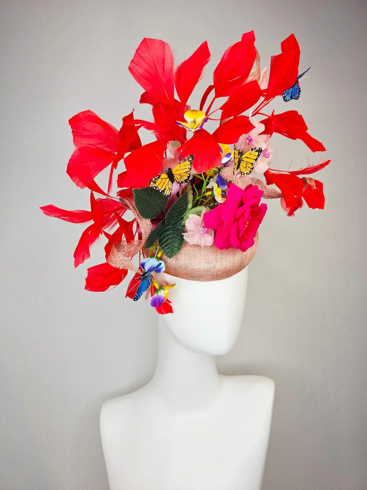 kentucky derby hat fascinator champagne pink sinamay fuchsia satin rose light pink flowers green leaves red feathers blue yellow butterflies