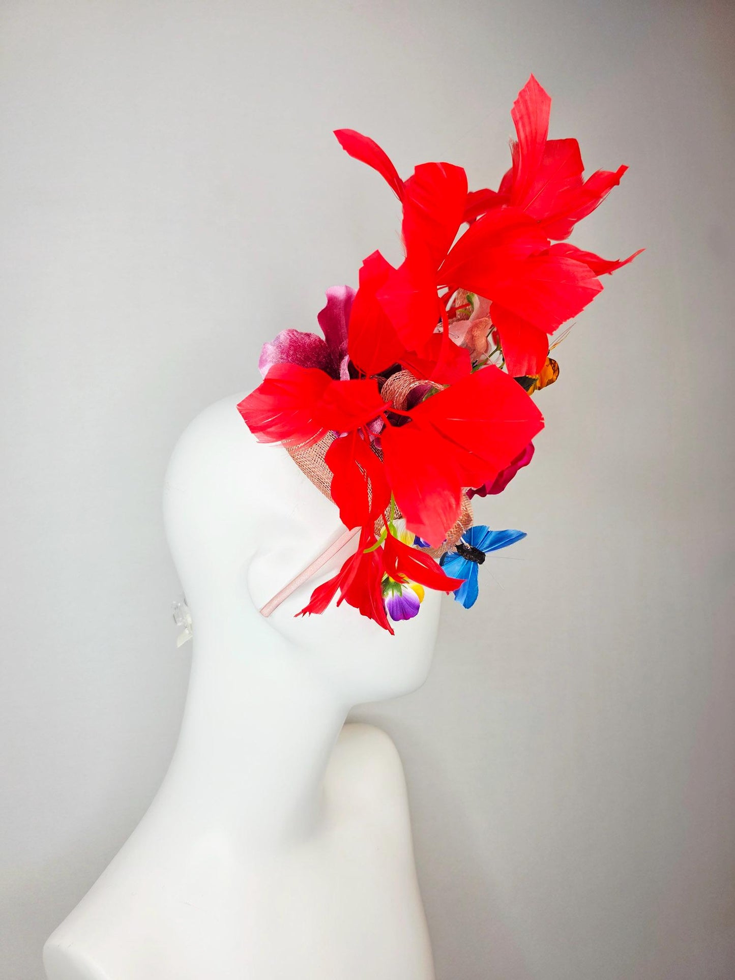 kentucky derby hat fascinator champagne pink sinamay fuchsia satin rose light pink flowers green leaves red feathers blue yellow butterflies