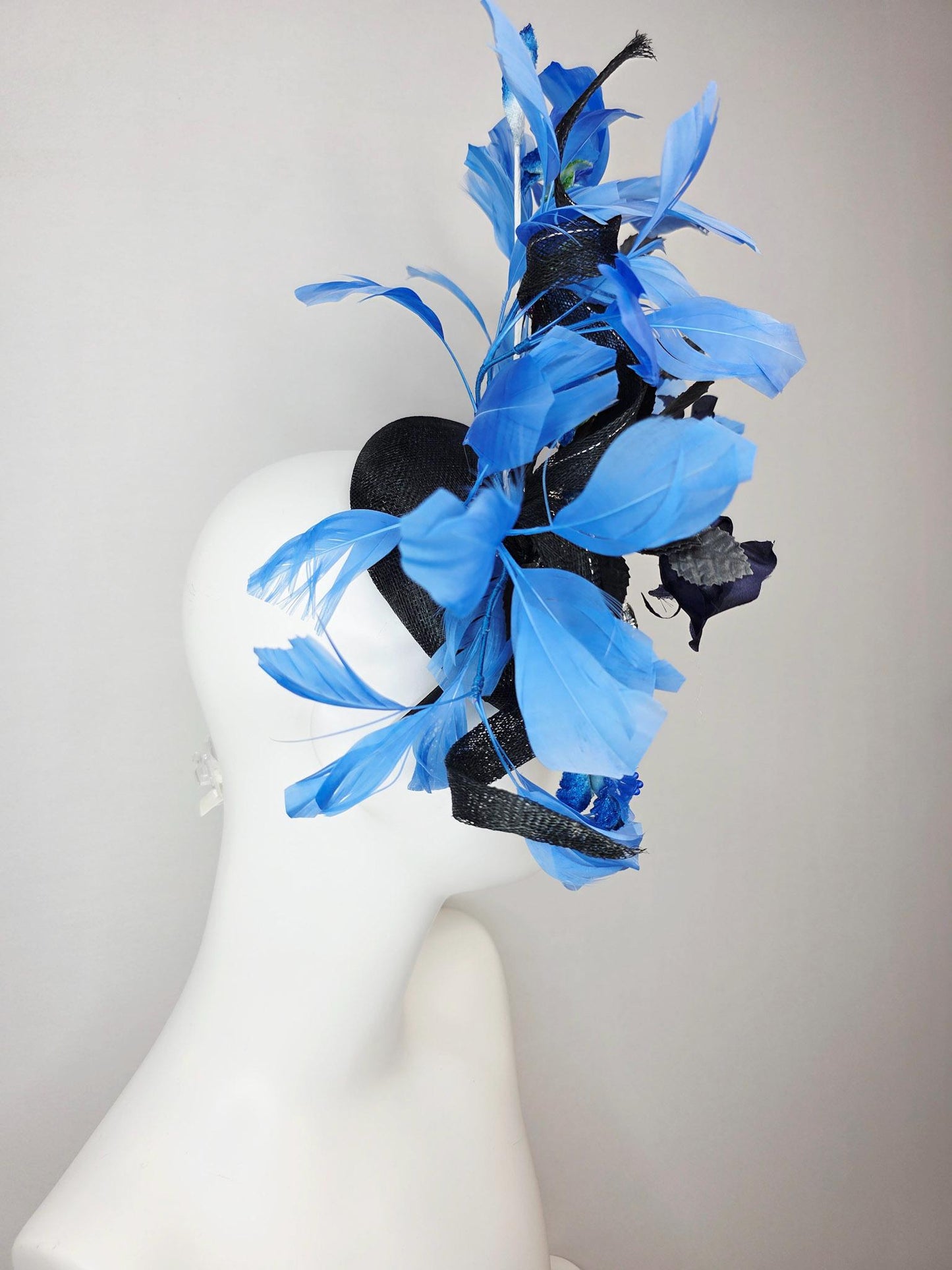 kentucky derby hat fascinator black sinamay with curls blue and clear crystal jewels navy blue satin roses black leaves royal blue feathers