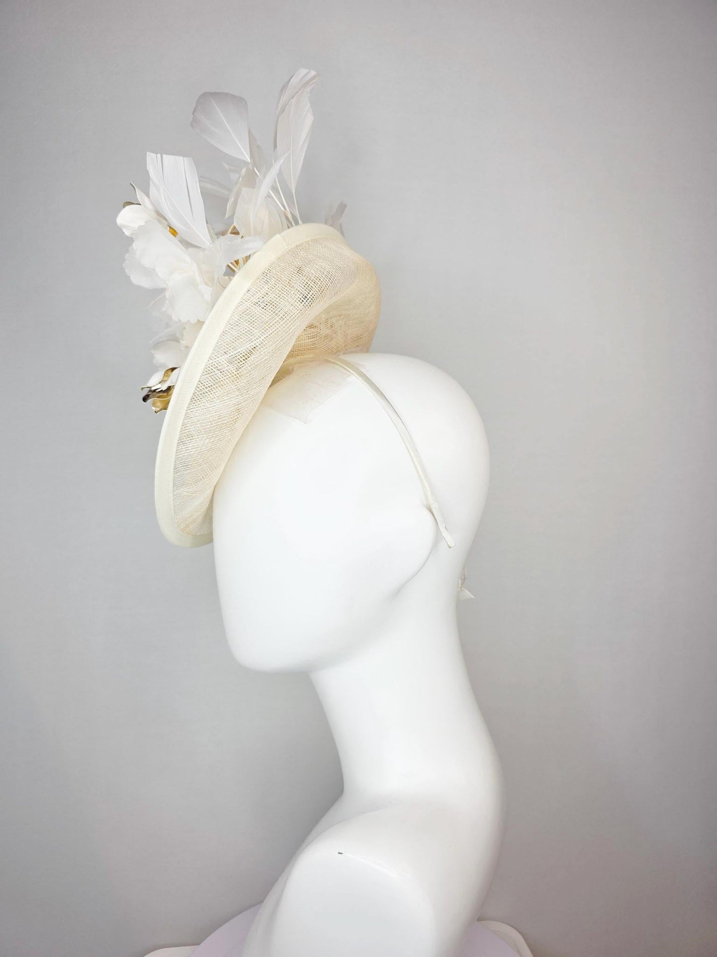 kentucky derby hat fascinator neutral cream ivory beige sinamay saucer with bow white organza flowers and gold orchids and white feathers