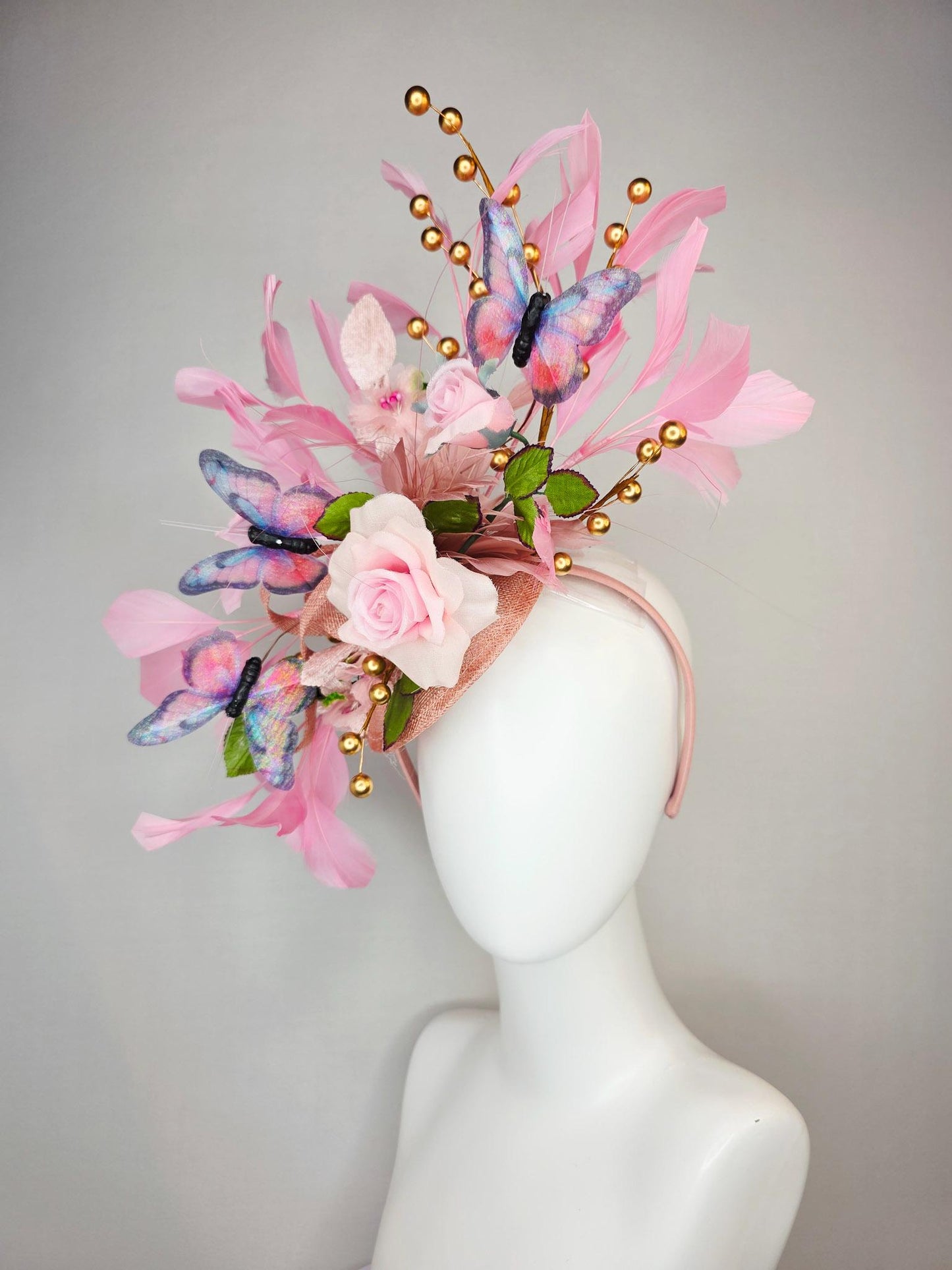 kentucky derby hat fascinator light pink satin rose green leaves dusty rose and baby blush pink feathers gold pearls pink blue butterflies