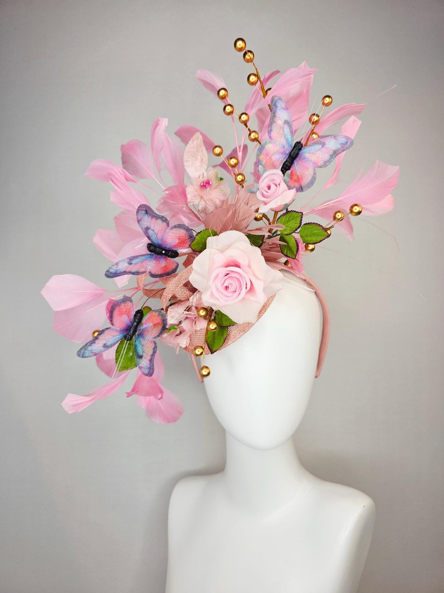 kentucky derby hat fascinator light pink satin rose green leaves dusty rose and baby blush pink feathers gold pearls pink blue butterflies