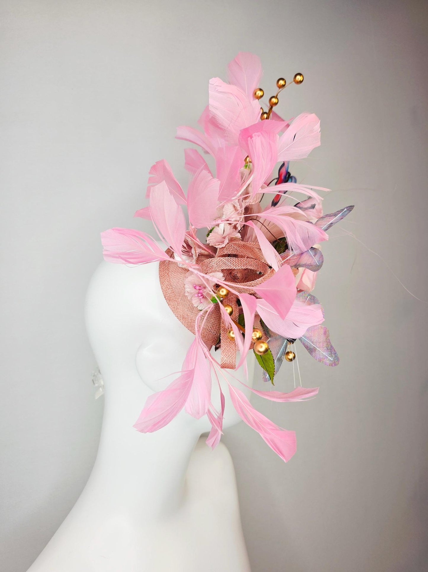 kentucky derby hat fascinator light pink satin rose green leaves dusty rose and baby blush pink feathers gold pearls pink blue butterflies